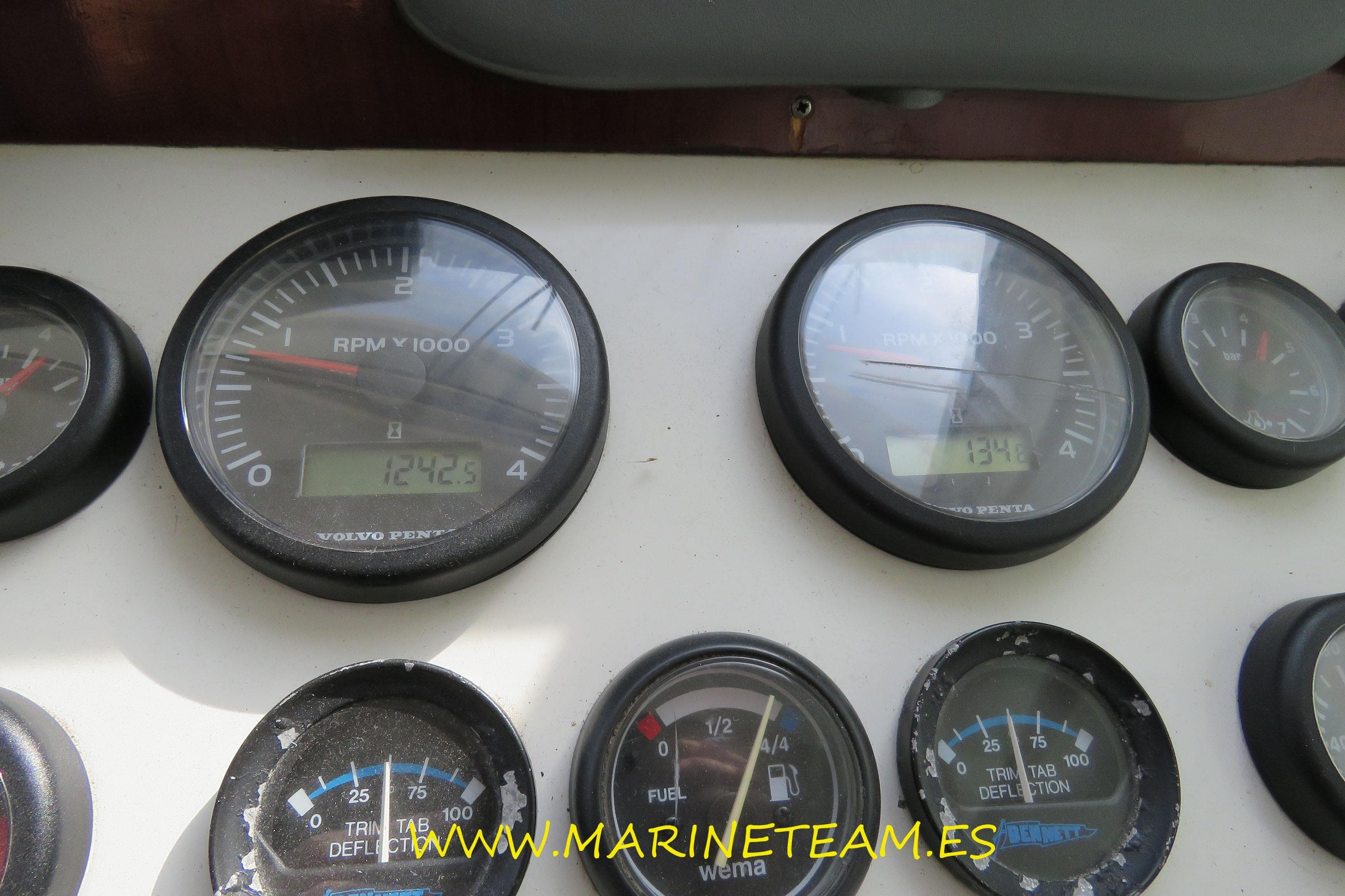 Control panel of a 2005 Starfisher 1060 boat with various gauges and dials.