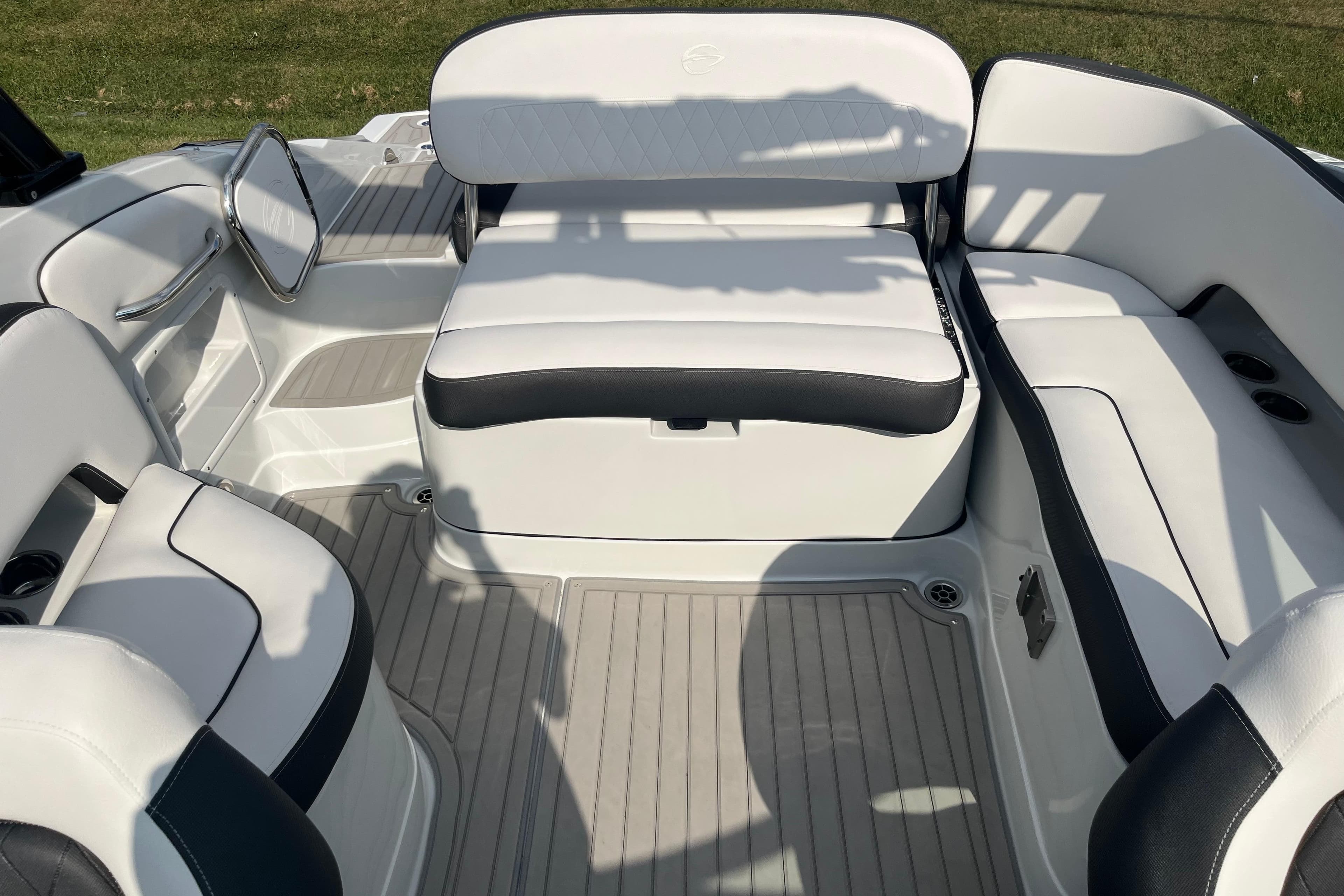 2025 Crownline Eclipse E235 boat interior with white and black seating.