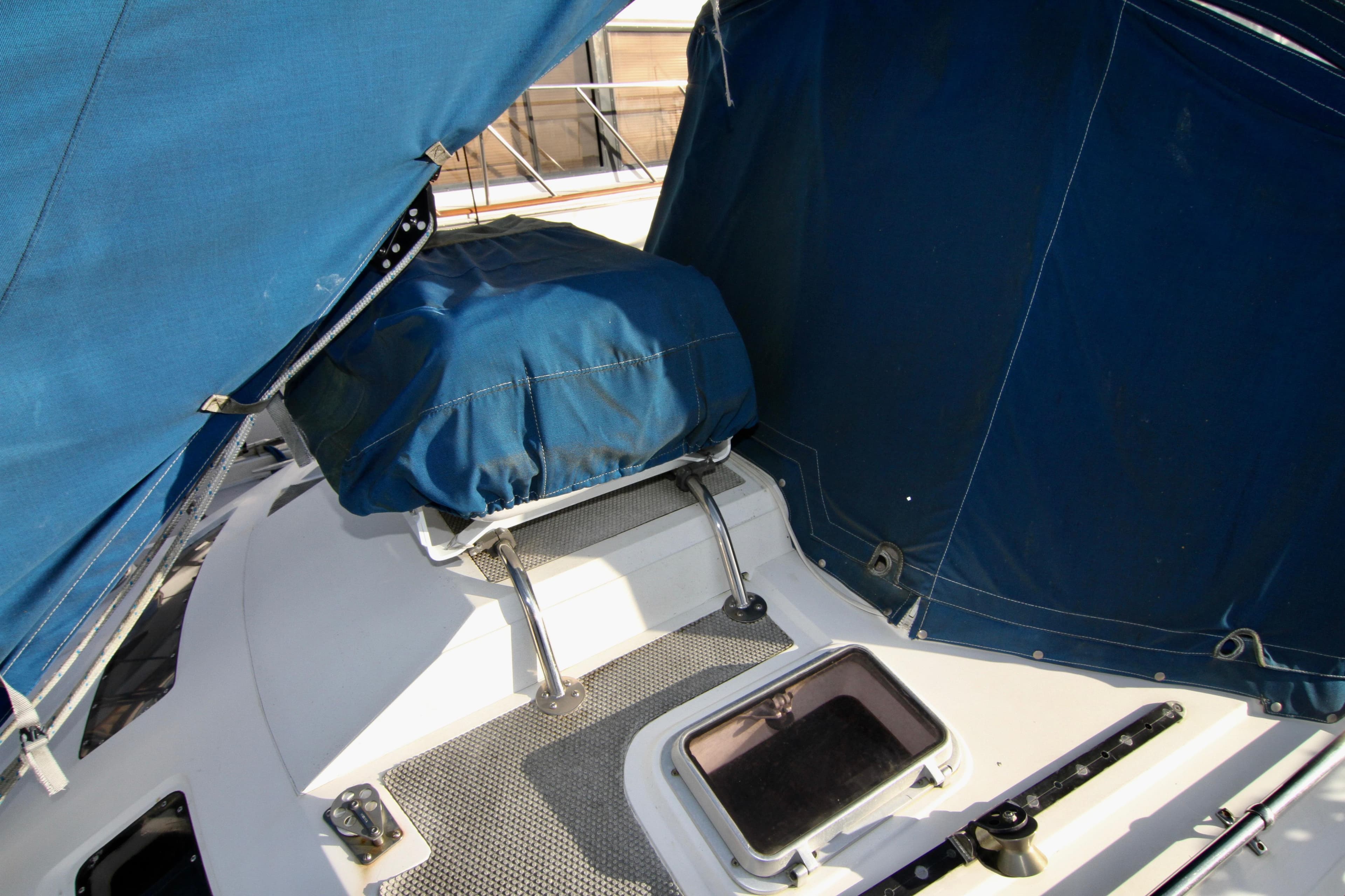 Norseman 447 sailboat cockpit with blue cover, year 1985.