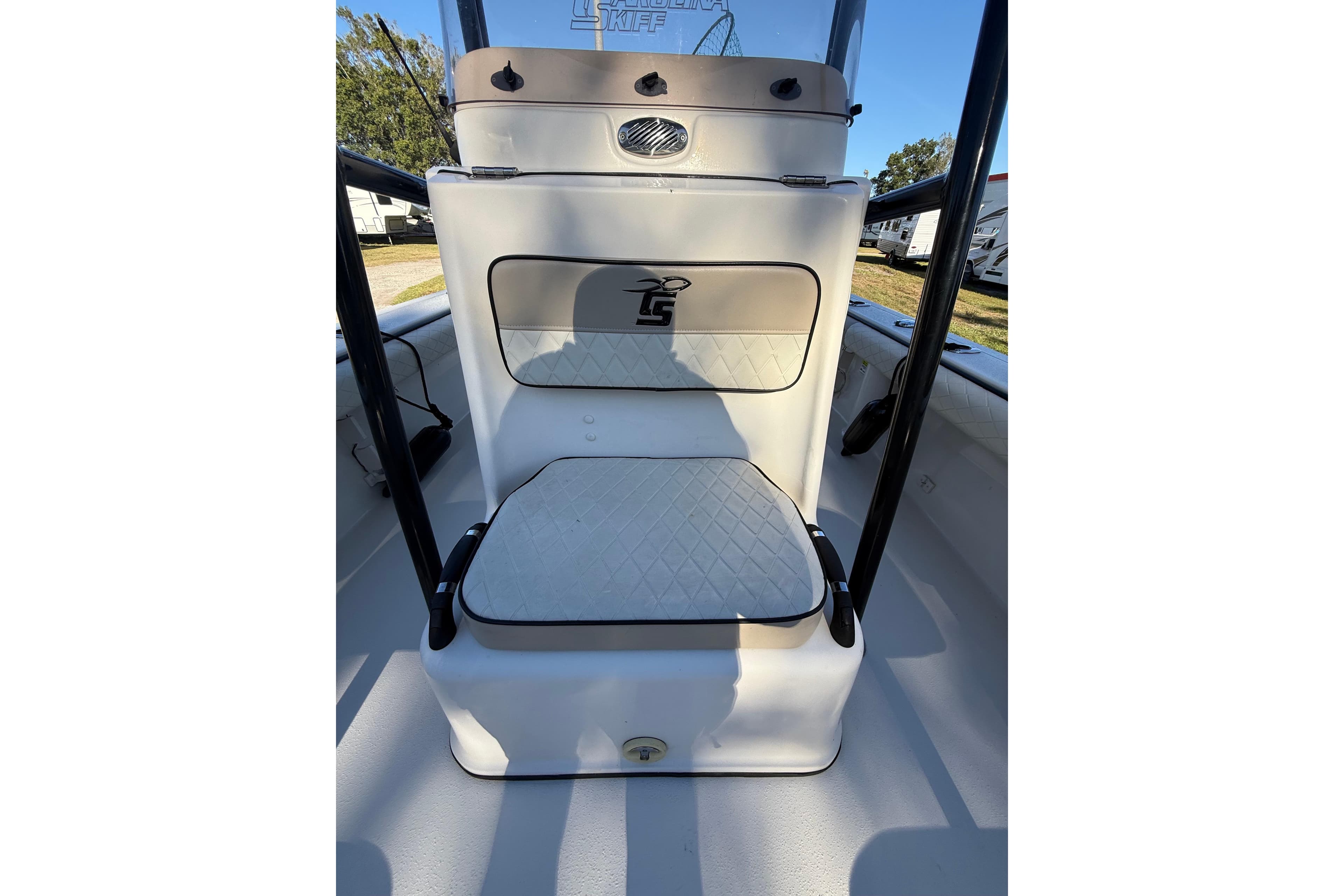 2021 Carolina Skiff 26 Ultra Elite boat seating area with cushioned backrest.