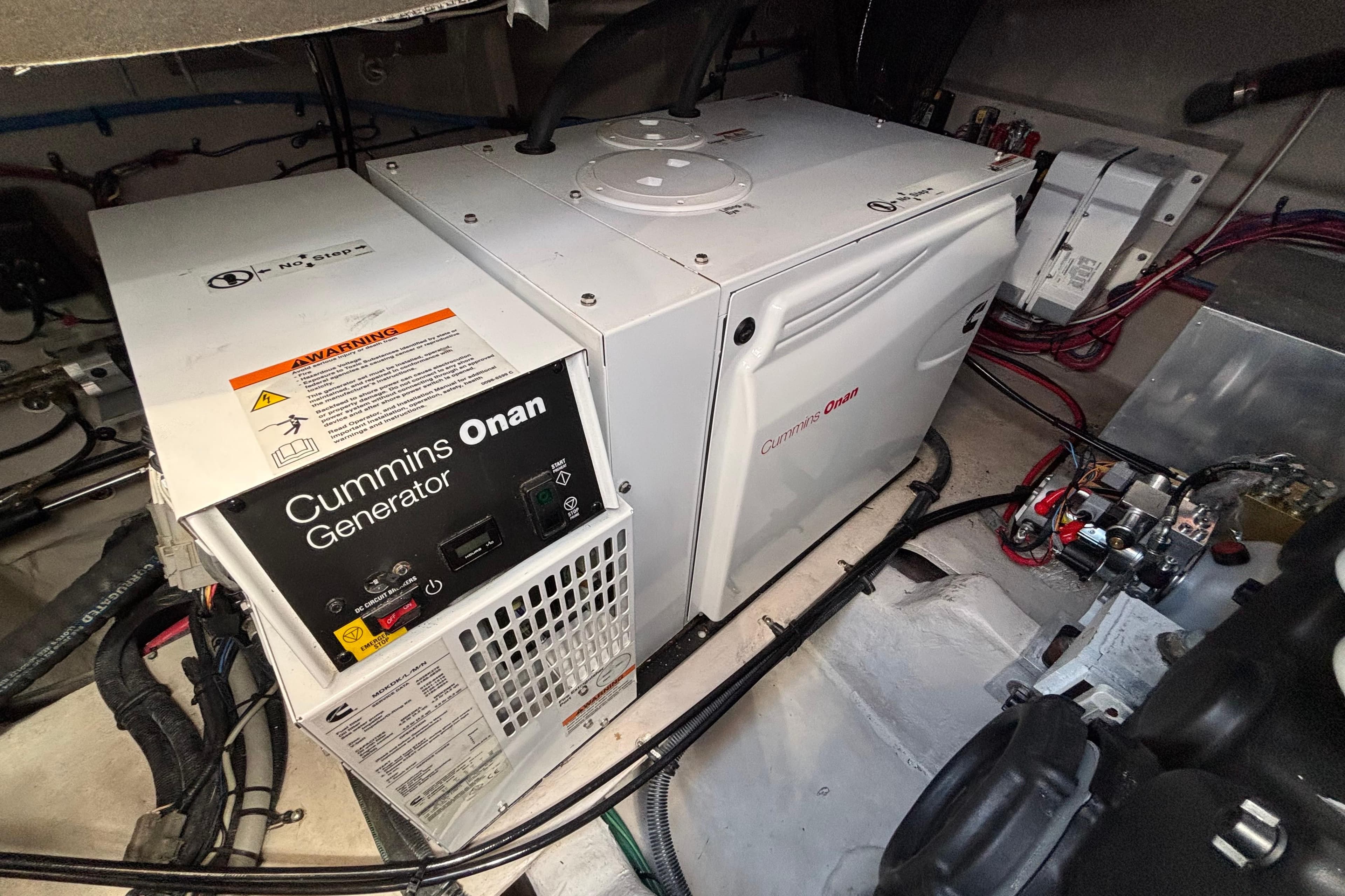 Cummins Onan generator in 2018 Sea Ray Sundancer 460 yacht engine room.