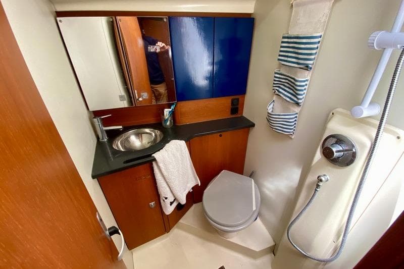 2008 Dehler 44 SQ yacht bathroom with sink, toilet, and shower.