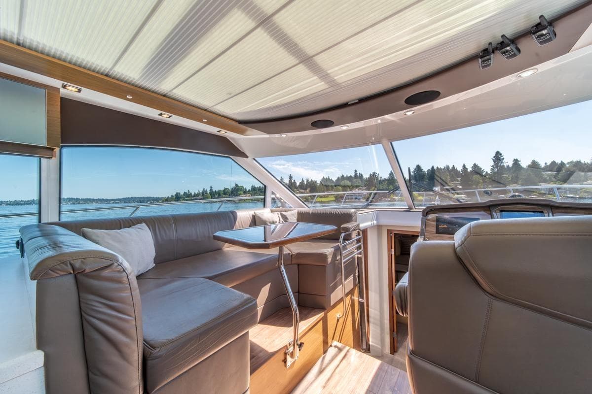 Luxurious interior of 2017 Cruisers Yachts 45 Cantius with scenic water view.