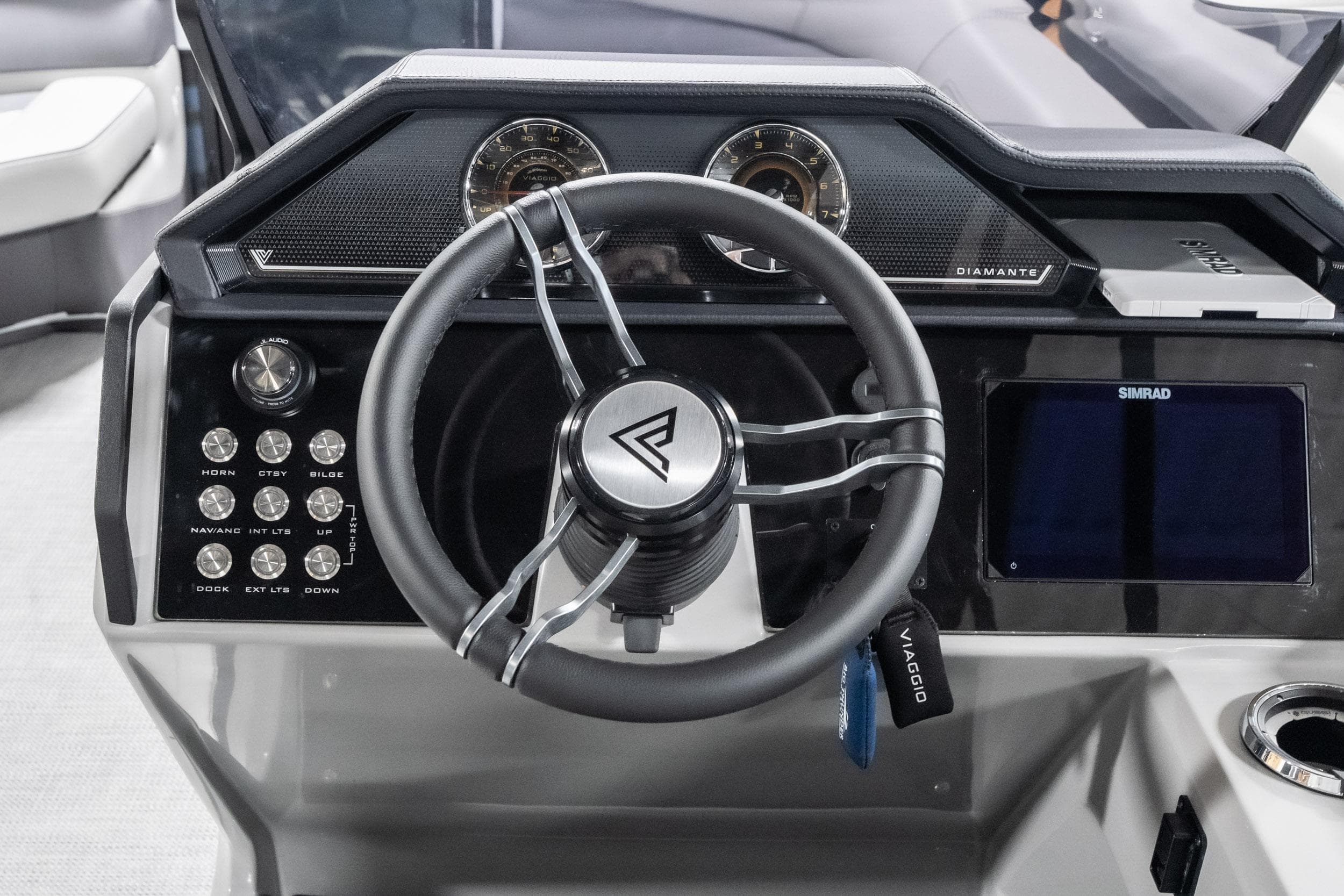 Steering console of 2026 Viaggio D22U boat with modern controls and display.
