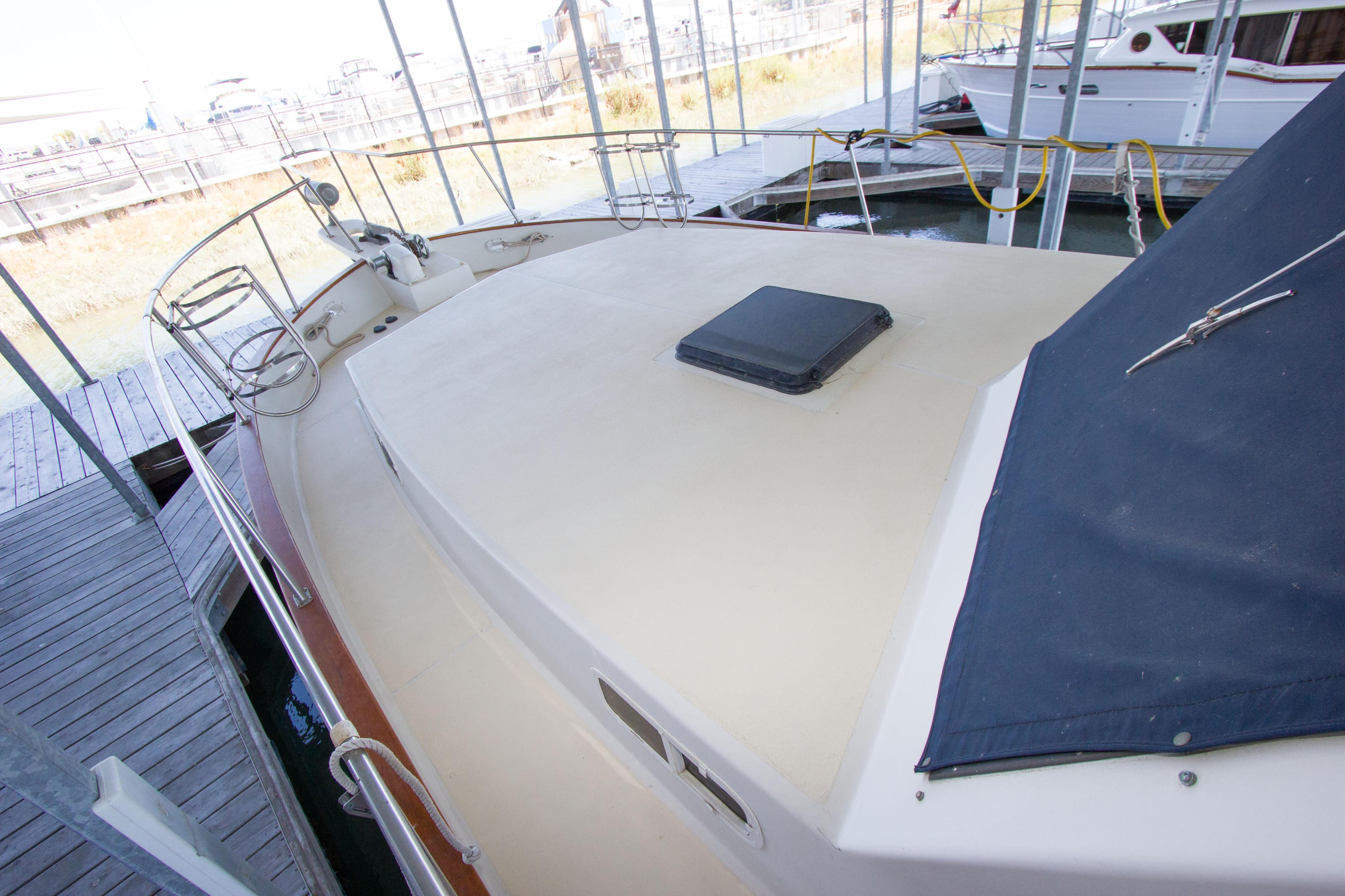 1984 Californian LRC yacht in harbor, deck view.
