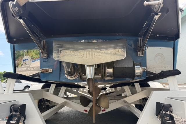 2021 Malibu M240 boat stern with propeller and surf gate system.