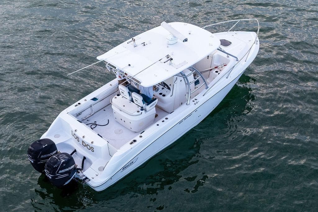 2005 Boston Whaler 320 Outrage Cuddy Cabin on water, aerial view.