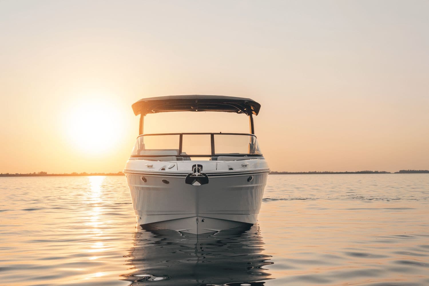 Sea Ray SLX 280 boat on water at sunset, 2025 model.