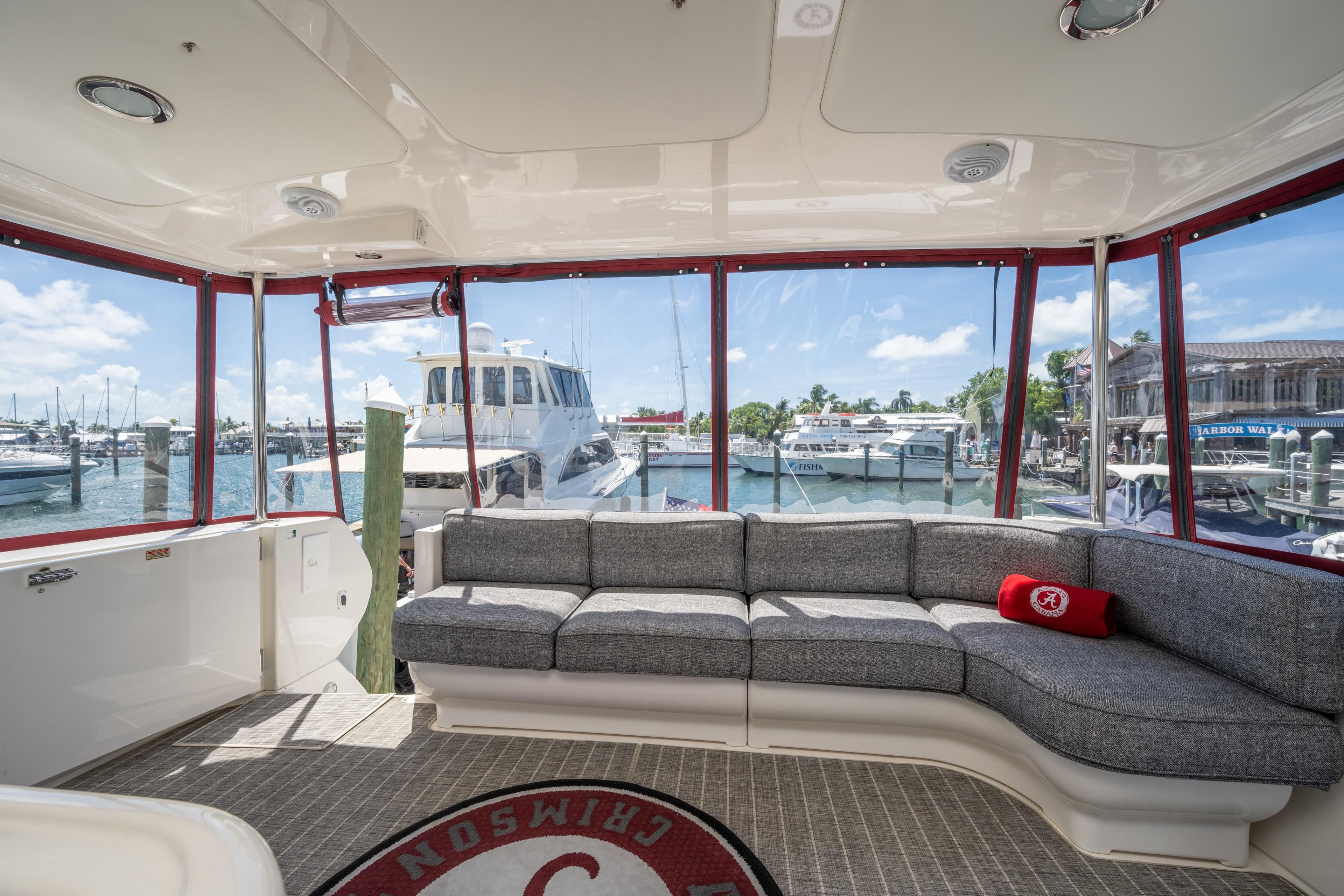 Luxurious interior of 2003 Sea Ray 480 Motor Yacht with marina view.