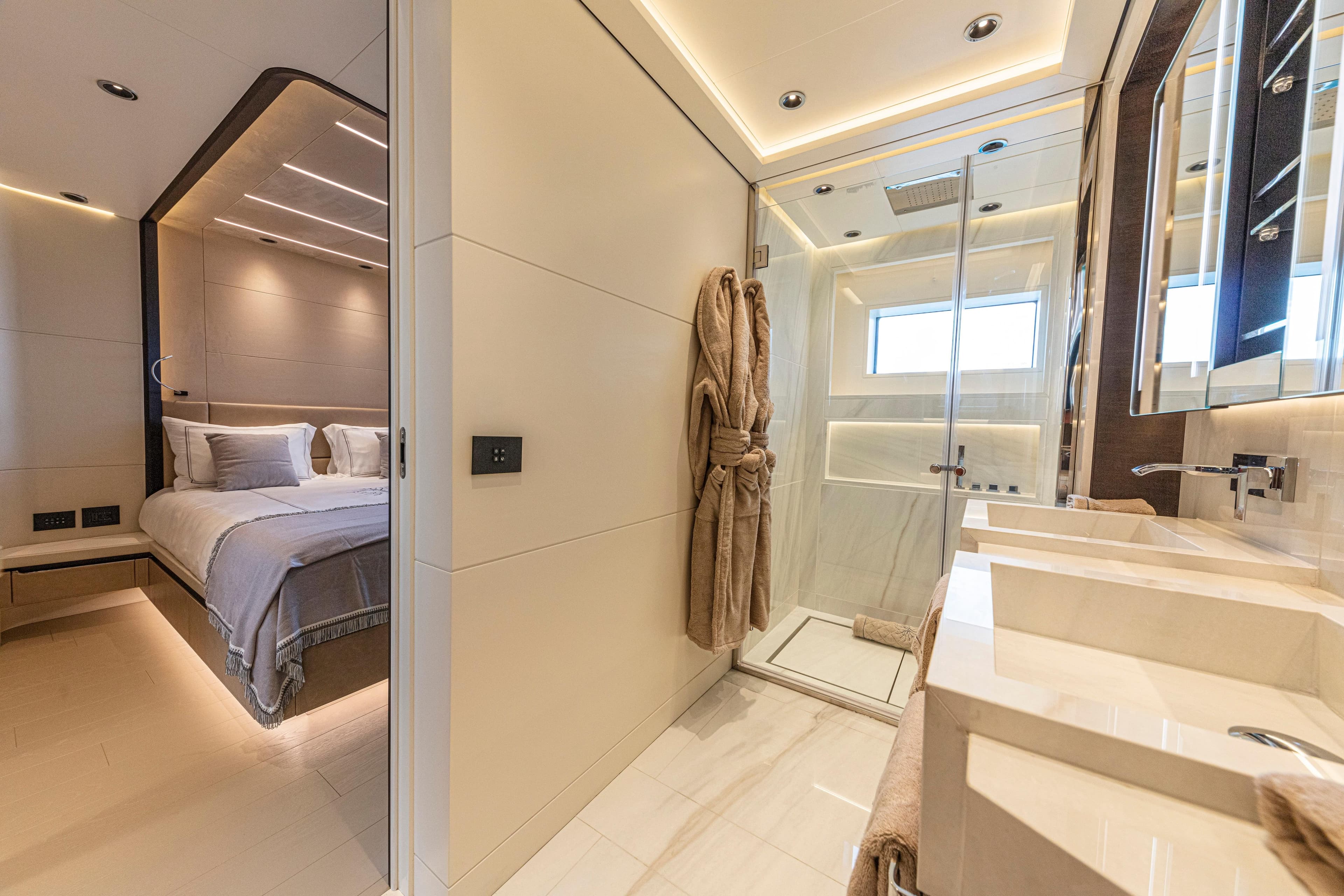 Luxurious Ocean King Ducale 120 yacht interior with modern bedroom and bathroom, 2027 model.
