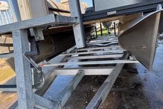 2023 Angler Quest 8522 All Sport pontoon boat on a trailer, underside view.