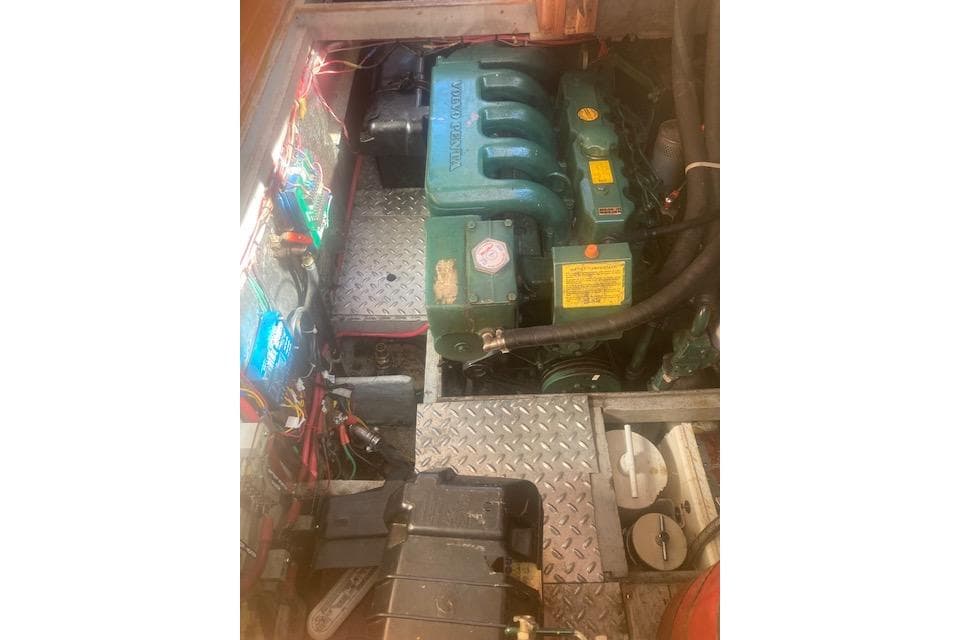 Engine compartment of a 1985 Baba 40 Pilot House sailboat, featuring a Volvo Penta engine.