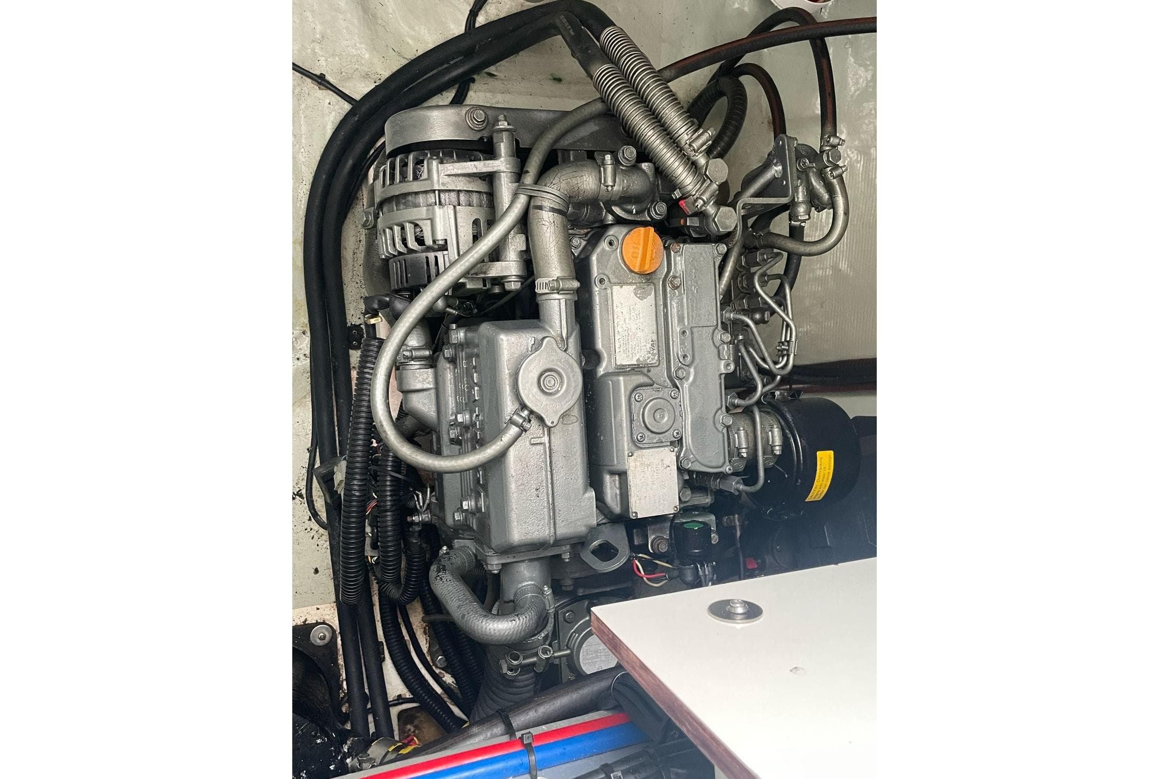 Engine of a 2020 Leopard 40 catamaran, showcasing intricate mechanical components.