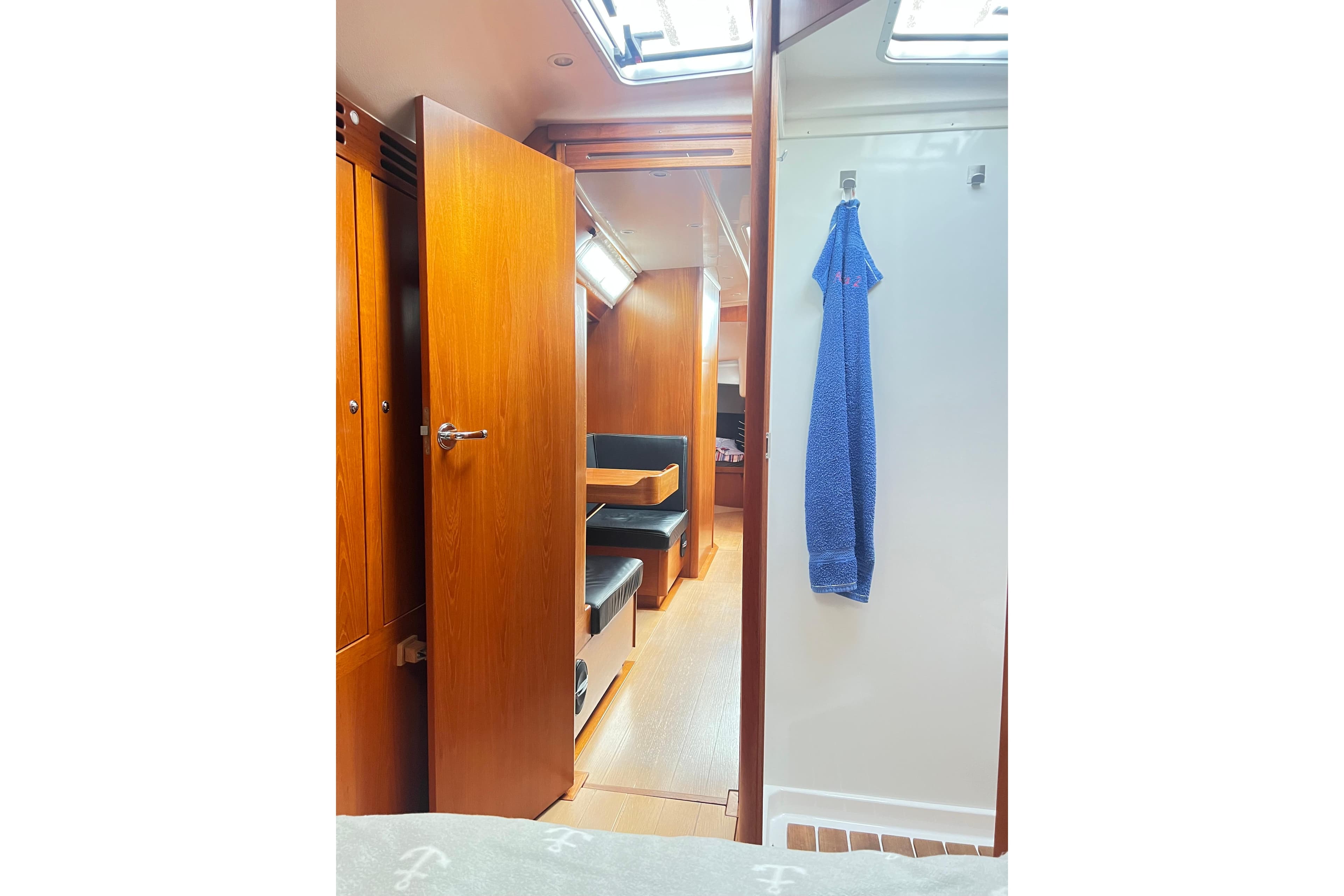 Interior of 2009 Luffe 45 yacht with wooden finishes and seating area.