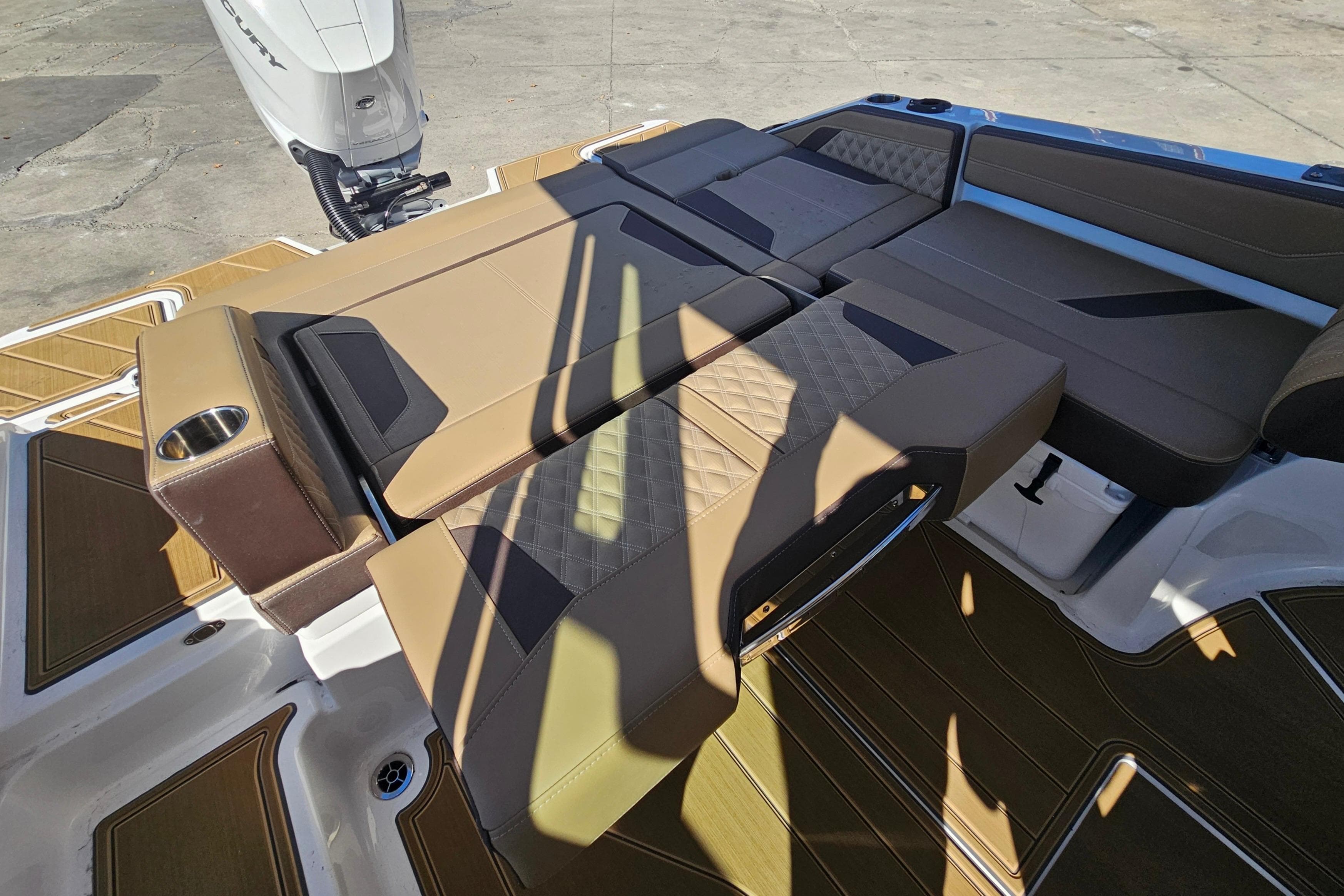 Luxury seating on 2026 Monterey Elite 27 OB boat, featuring premium upholstery and modern design.