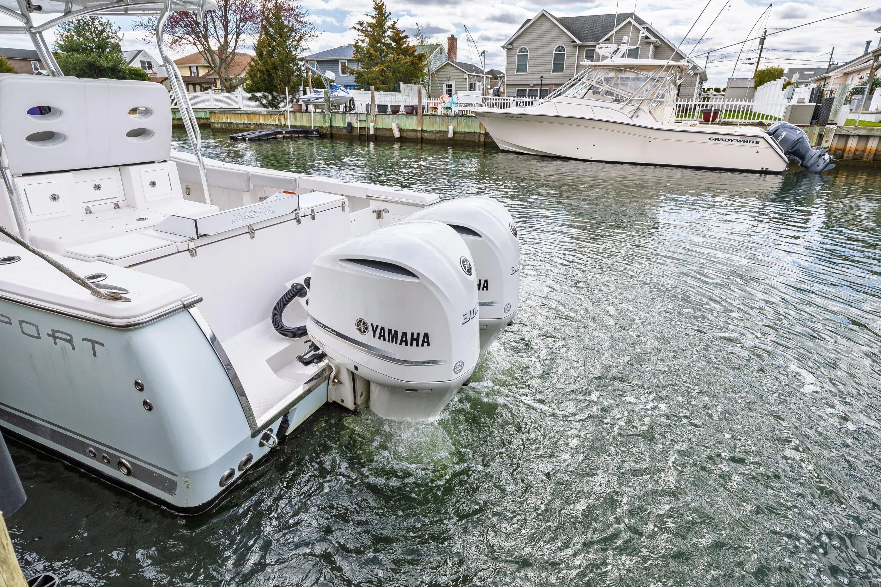 2018 Southport 29 FE boat with Yamaha engines in water.