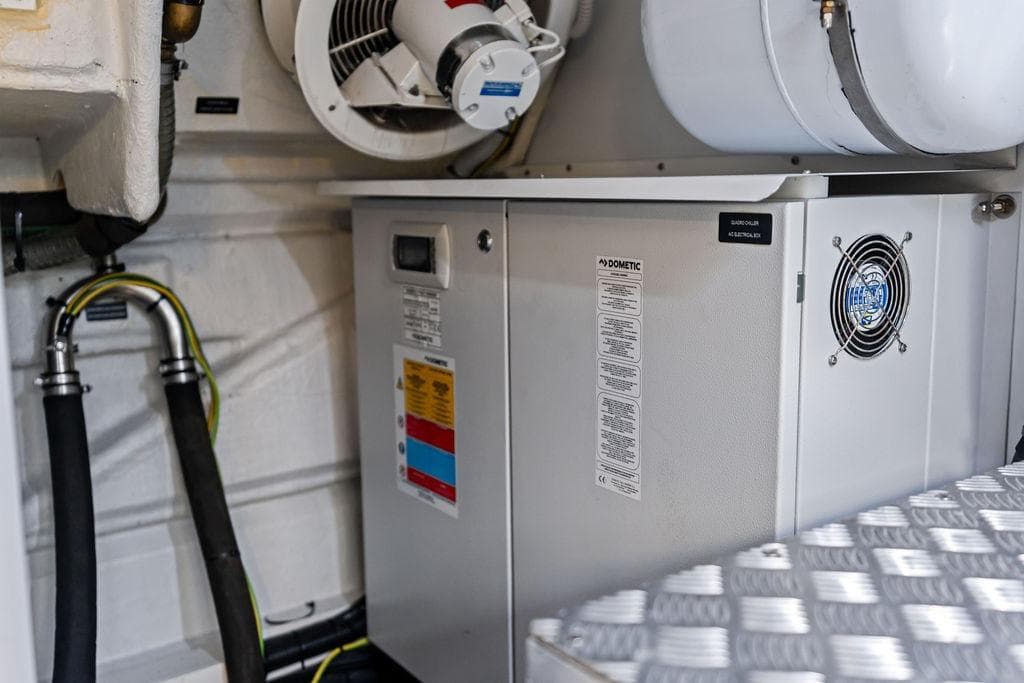 Engine room of 2025 Pershing GTX 80 yacht featuring Dometic equipment.