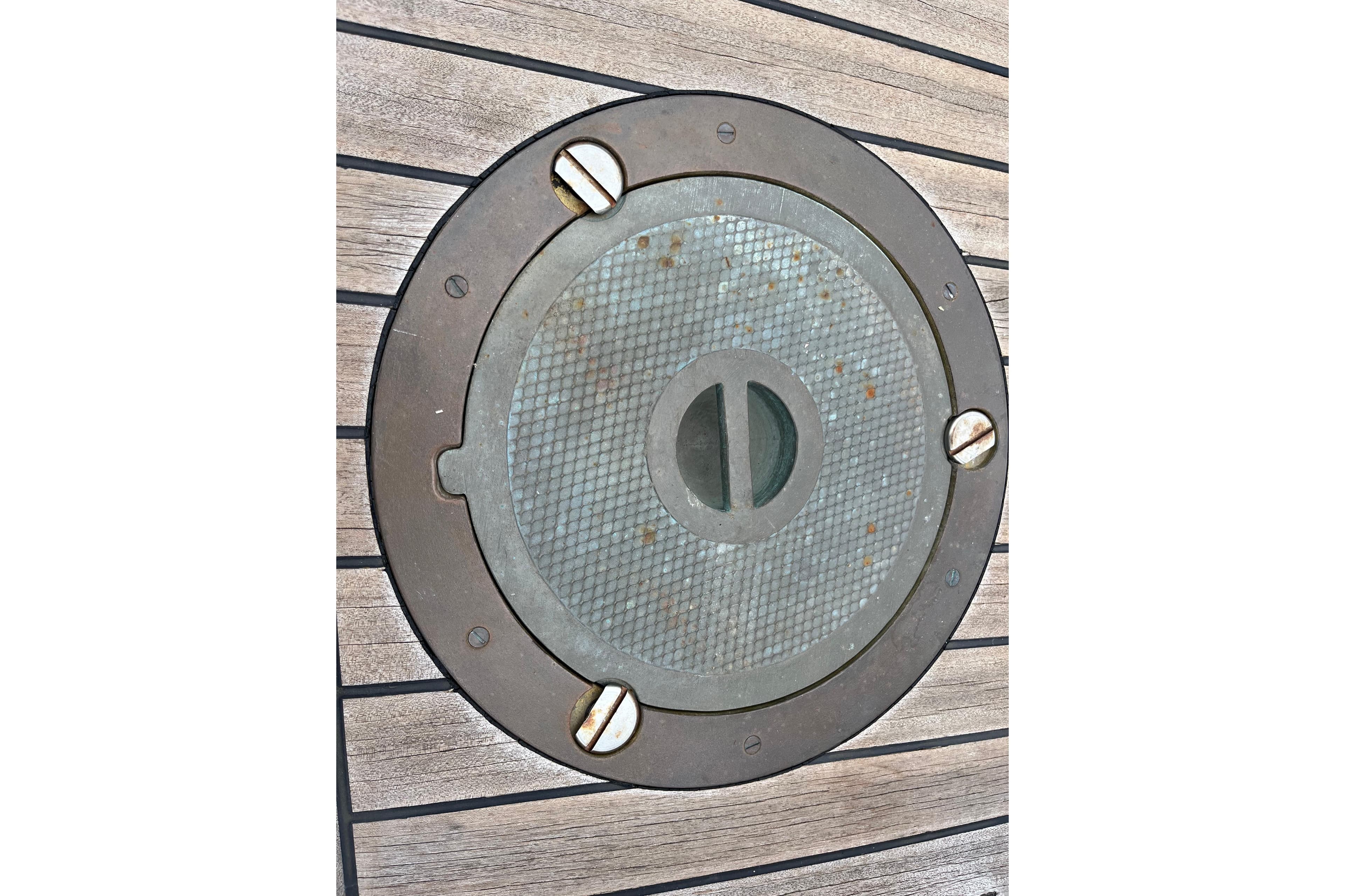 Round metal hatch on 1947 Murray Peterson Schooner deck.