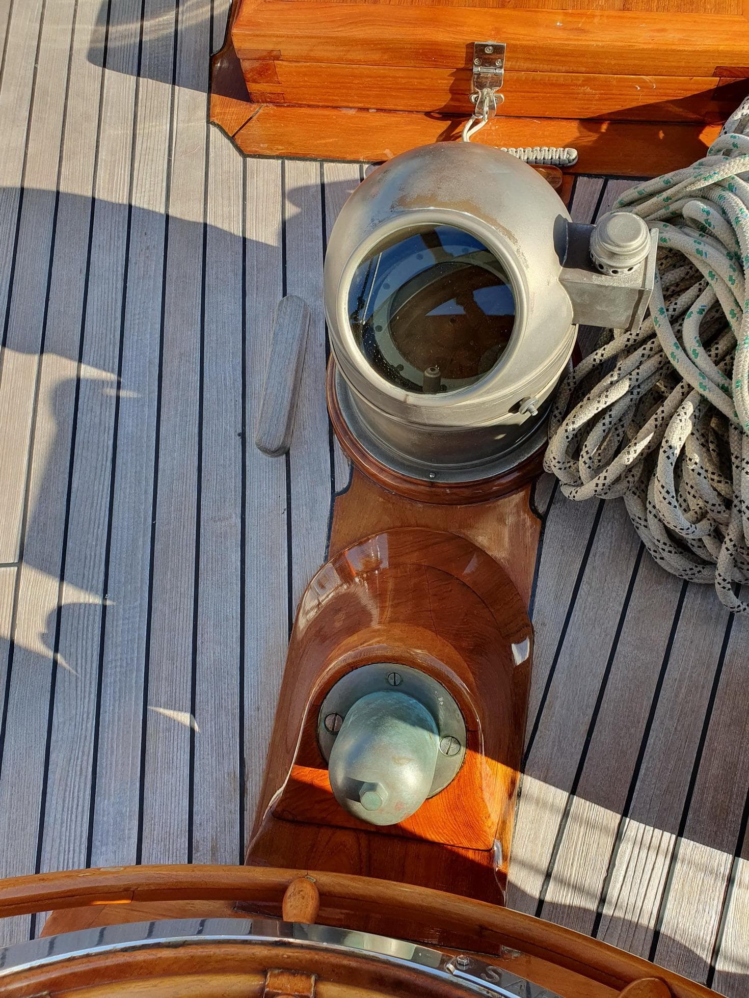 Classic 1933 Camper & Nicholsons 114FT Ketch deck with nautical equipment and coiled rope.