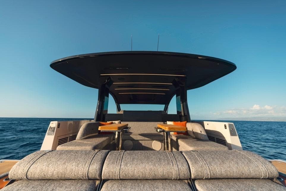 Luxury Invictus TT550 yacht interior, 2025 model, with ocean view and modern seating.