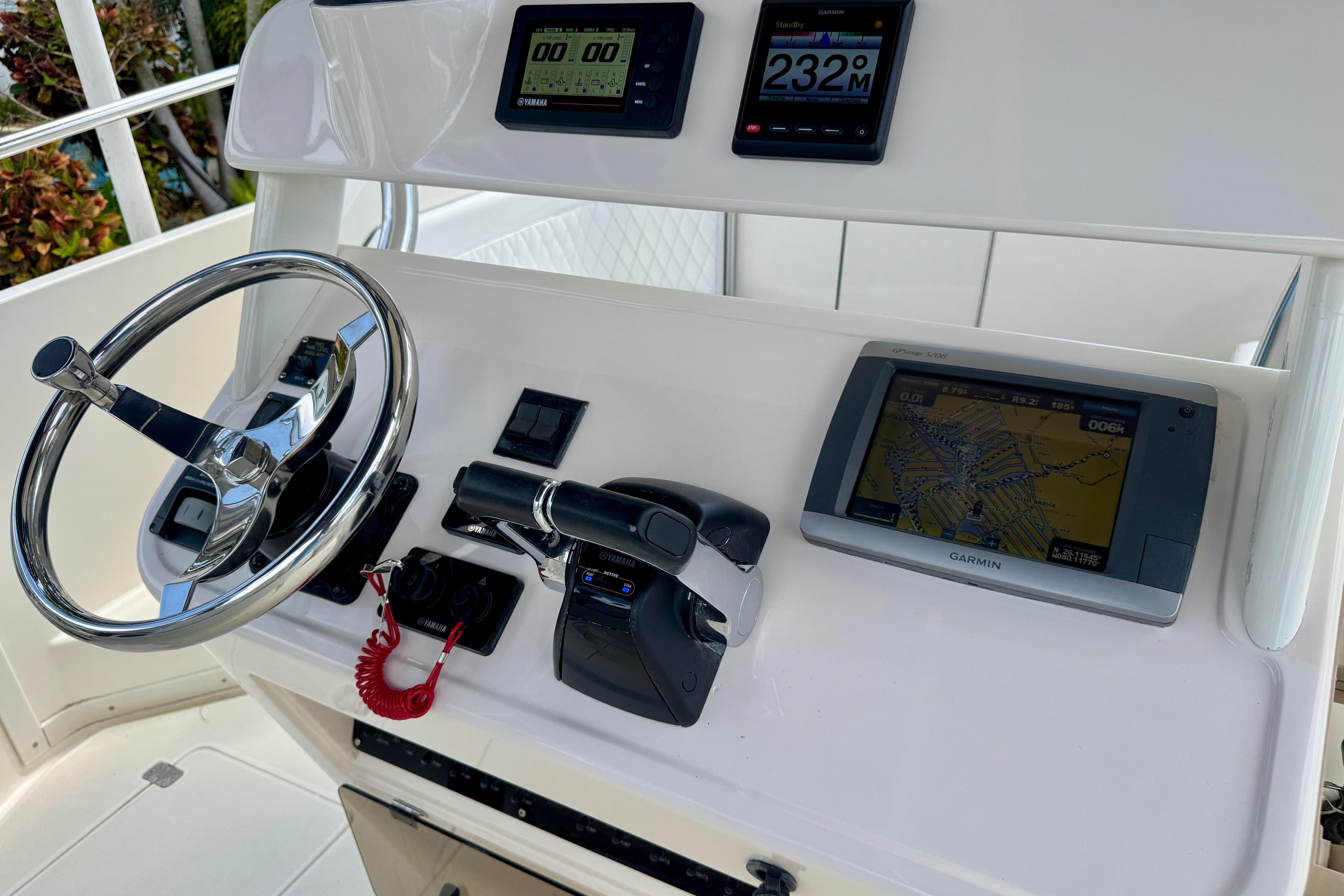 2001 Intrepid 339 Walkaround helm with Garmin GPS and Yamaha controls.