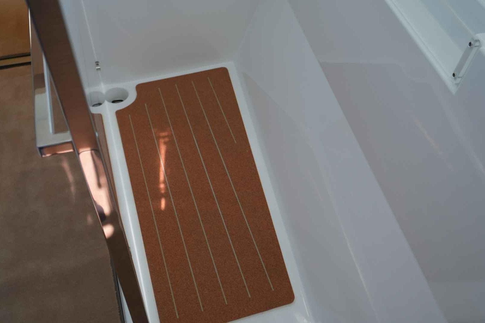 Interior detail of 2026 Fountaine Pajot Tanna 47 yacht, featuring sleek flooring design.