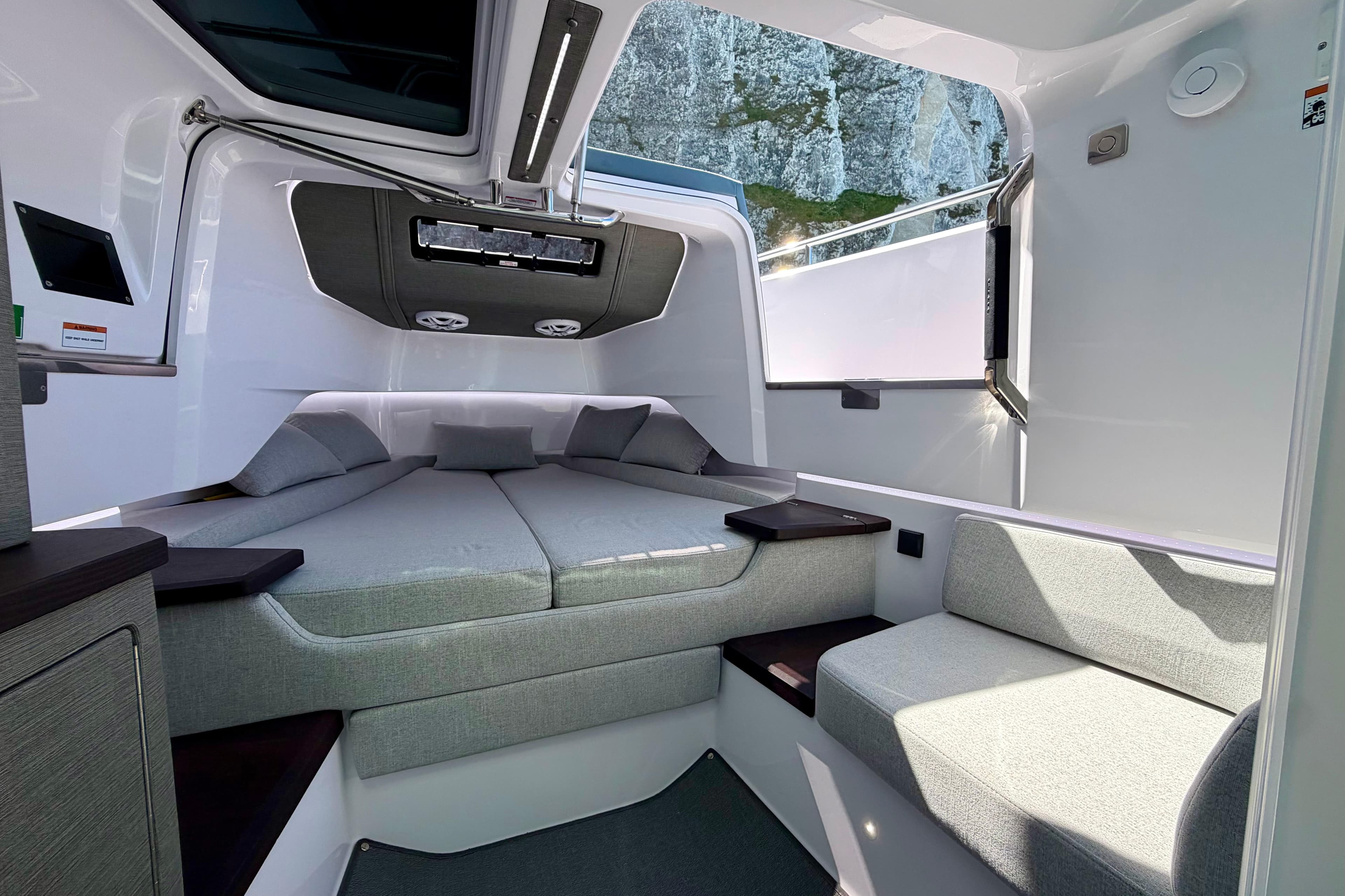 2024 Axopar 37 XC Cross Cabin interior with modern seating and sleek design.