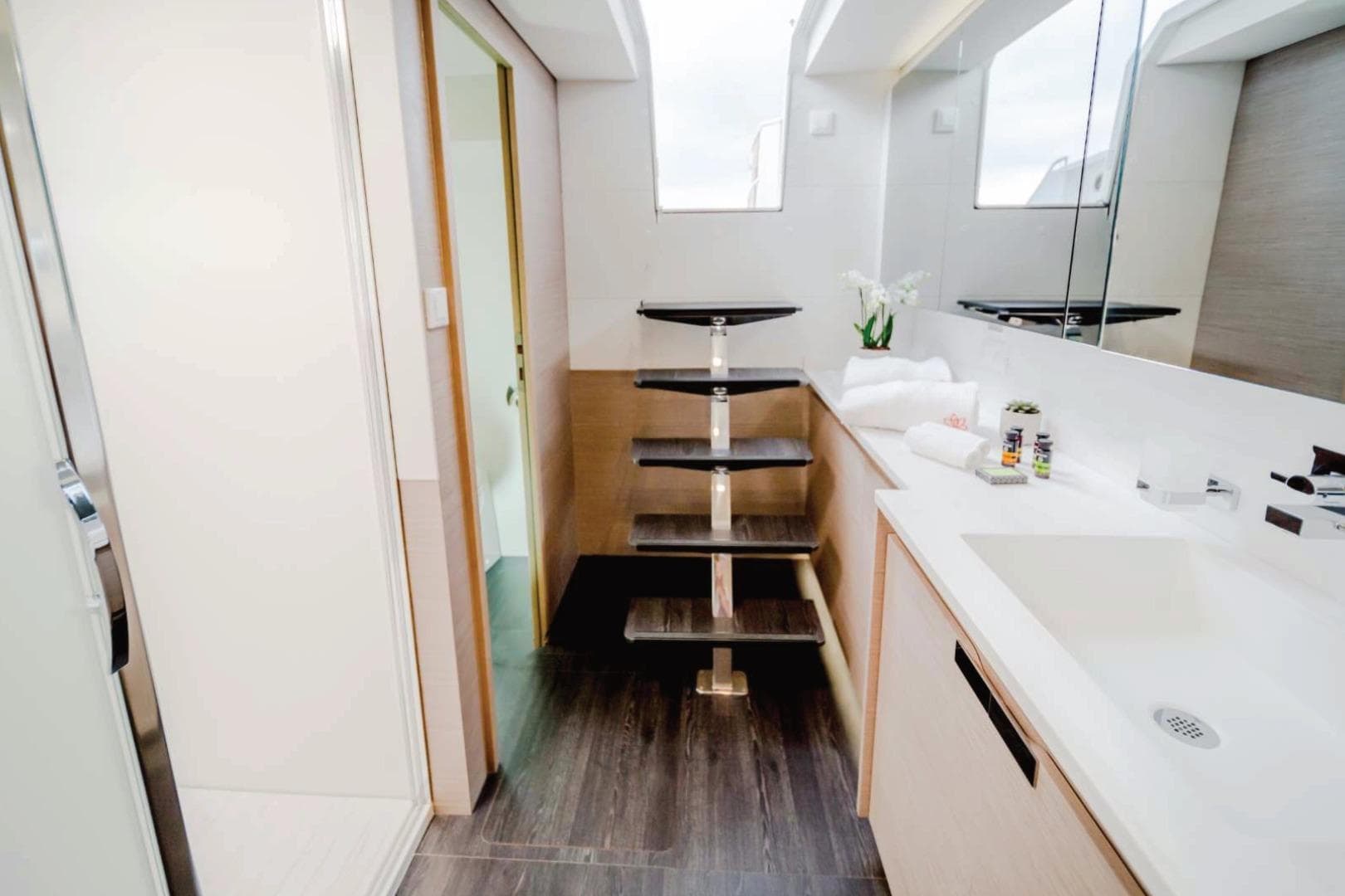 Luxurious bathroom interior of 2021 Fountaine Pajot Samana 59 yacht with modern fixtures.