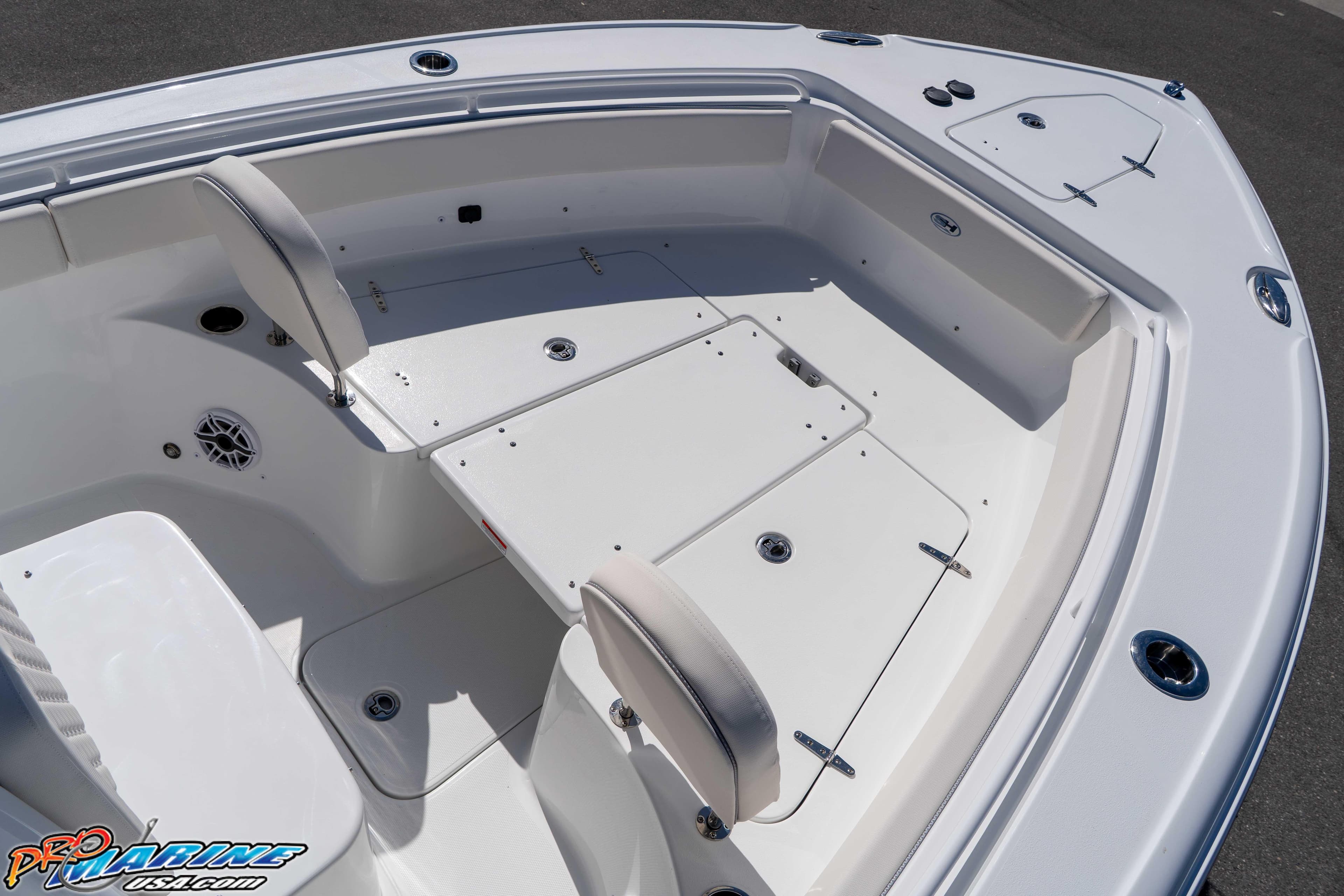 2026 Sea Hunt Ultra 265 SE boat interior with seating and storage compartments.