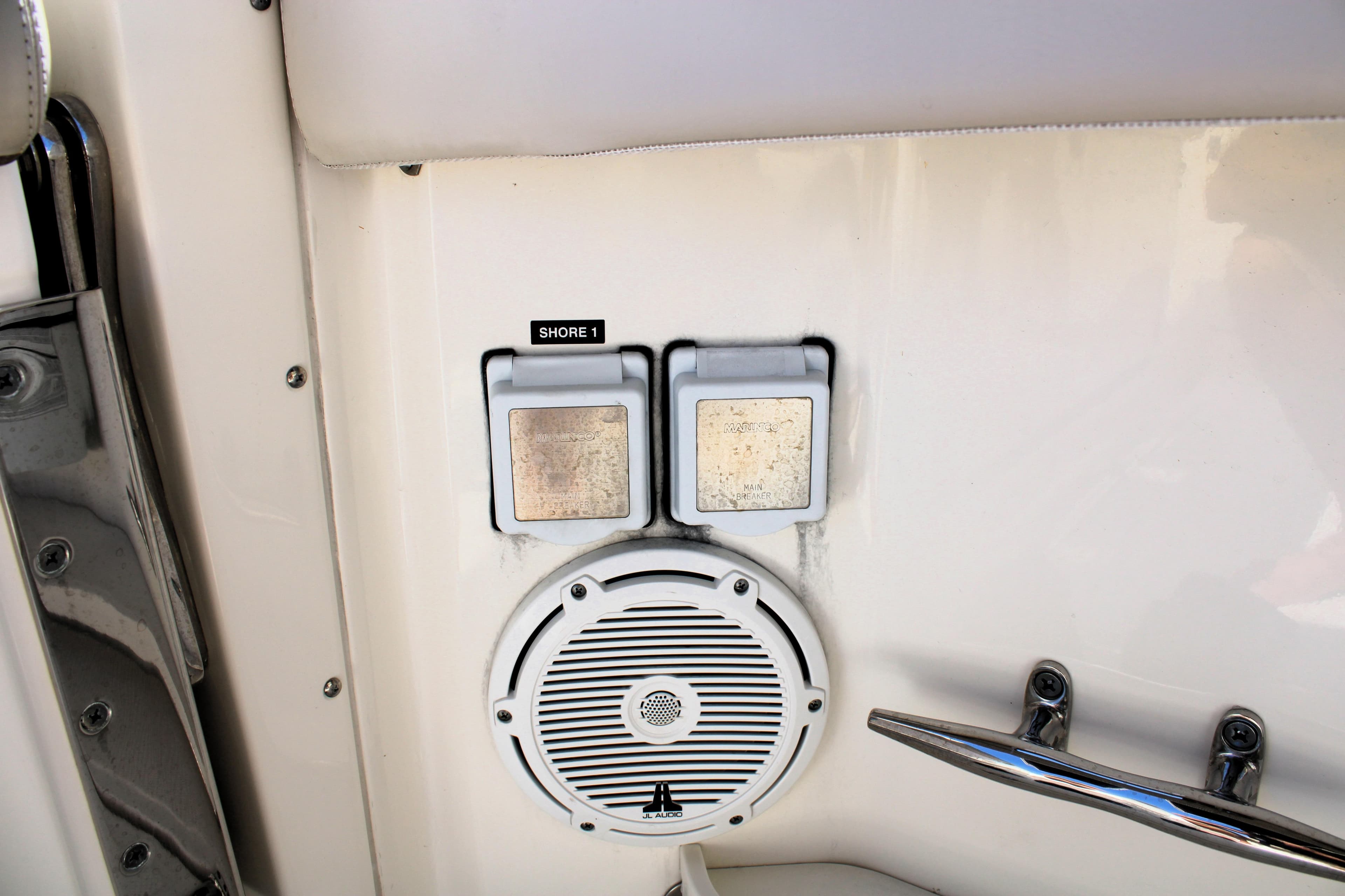 2021 Boston Whaler 320 Vantage boat speaker and shore power outlet.