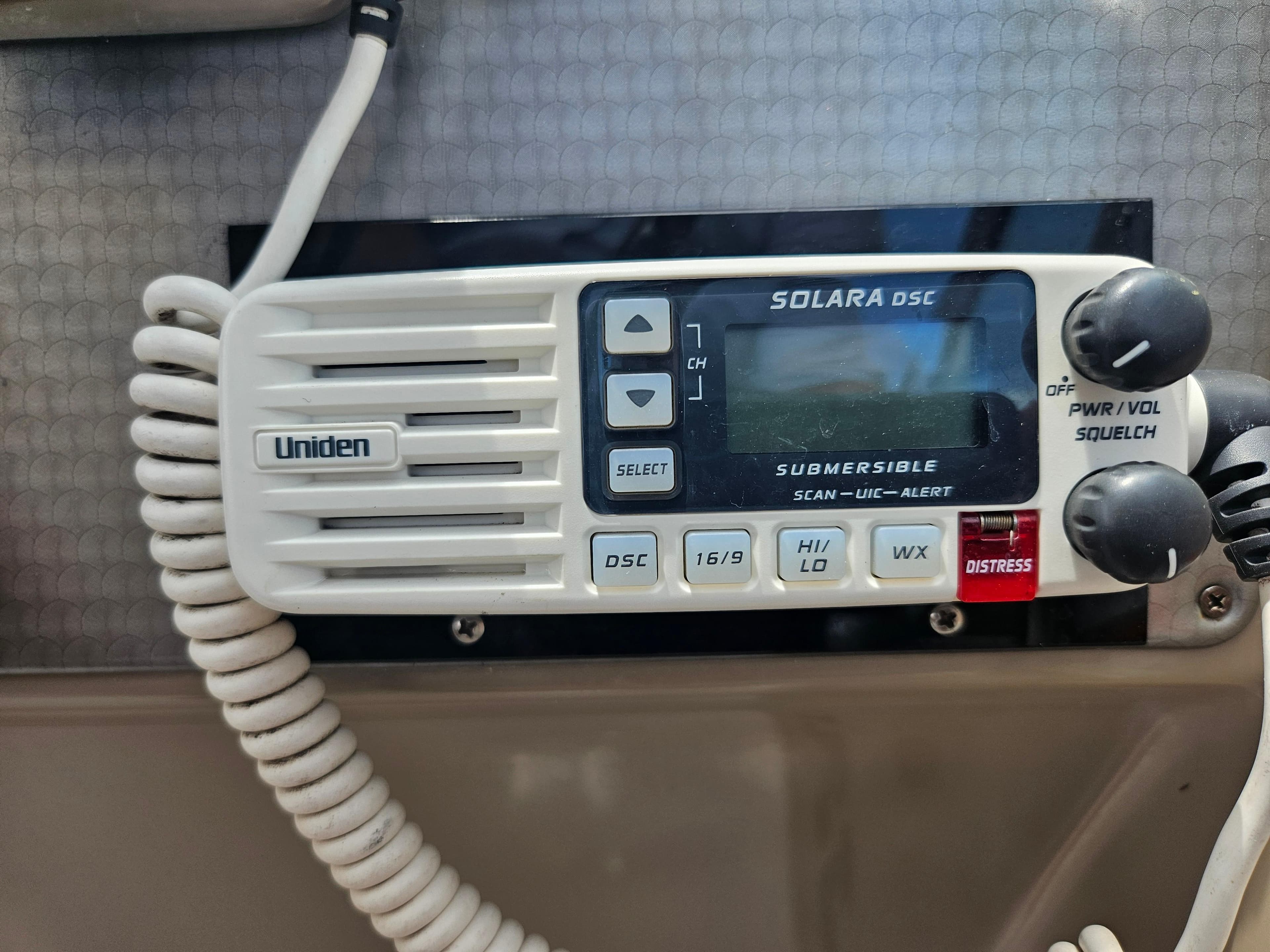 Uniden Solara DSC marine radio on 2005 Four Winns 378 Vista boat dashboard.