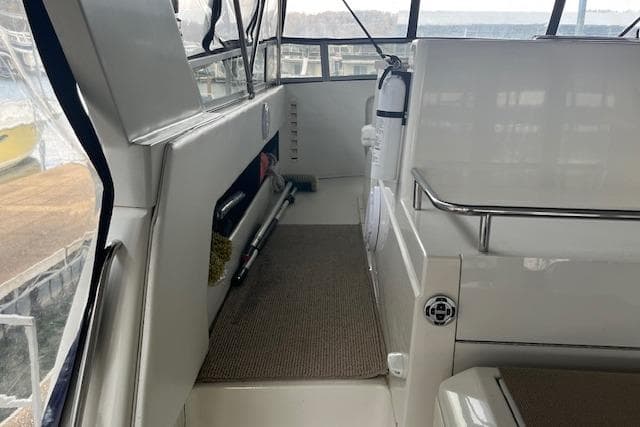 1996 Carver 370 yacht interior with clean, spacious deck and modern amenities.