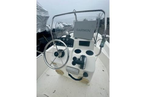 2014 Boston Whaler Montalk boat console with Garmin navigation system.