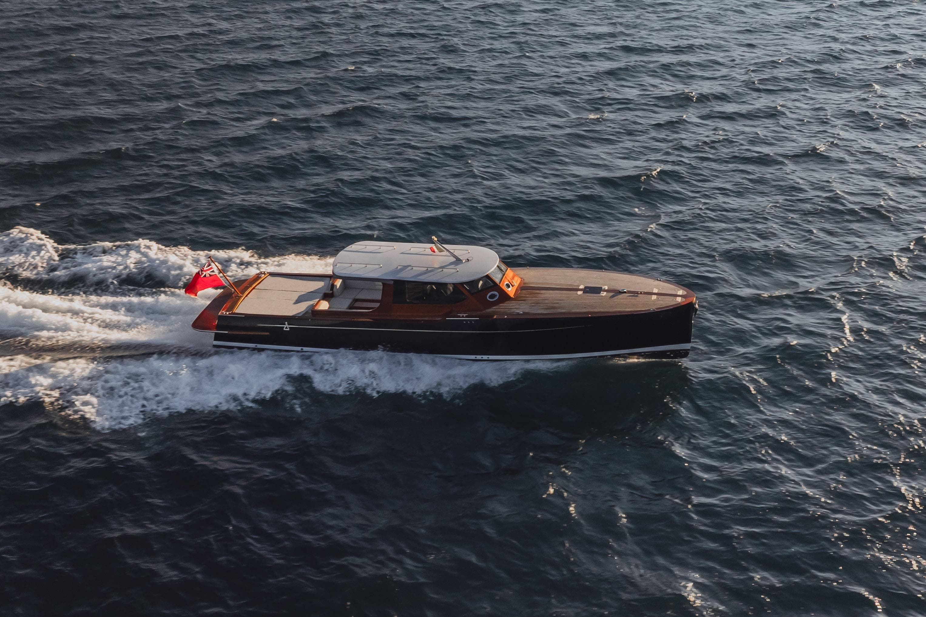 Aerial view of 2026 Spirit P50 yacht cruising on open water.