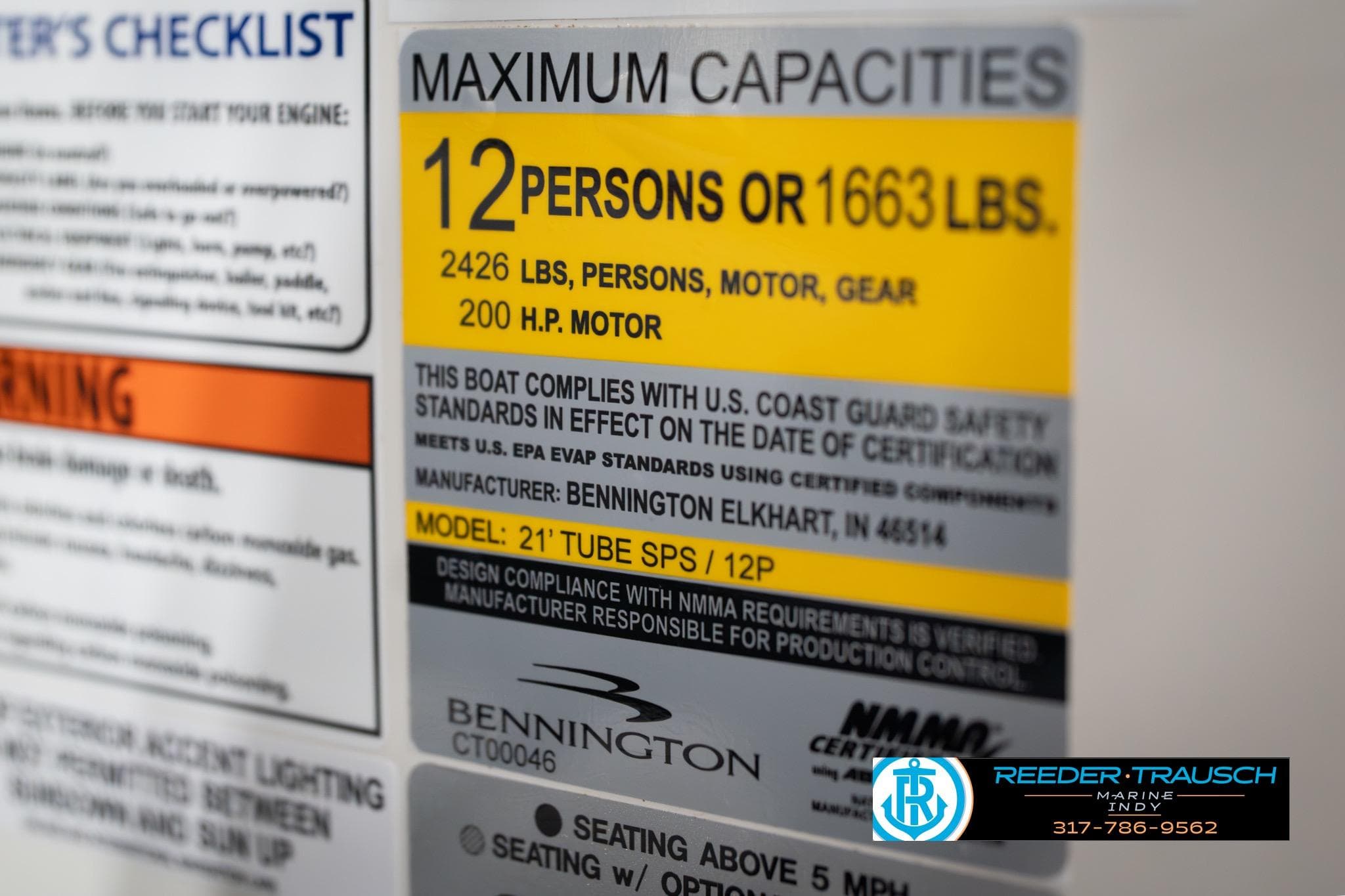 Bennington 22 ML 2026 boat capacity label, 12 persons or 1663 lbs, 200 HP motor.
