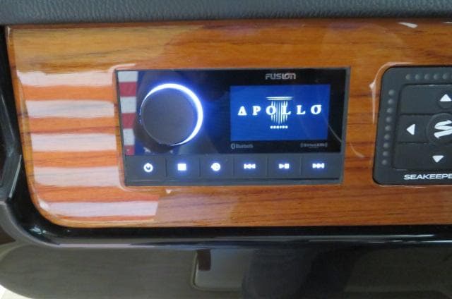 2024 Chris-Craft Calypso 32 dashboard with Fusion Apollo audio system.