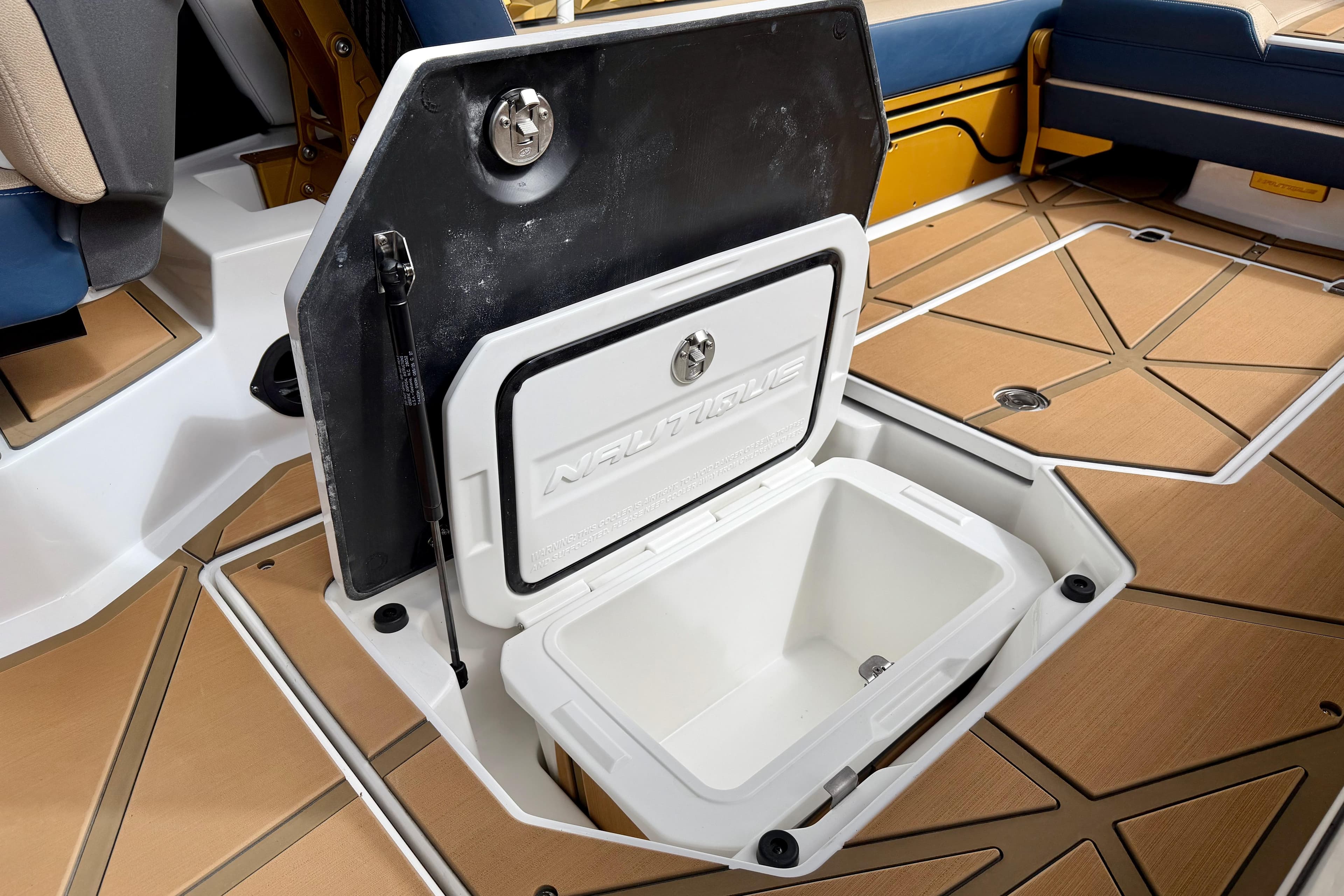 2025 Nautique Super Air Nautique G25 Paragon storage compartment with open hatch.