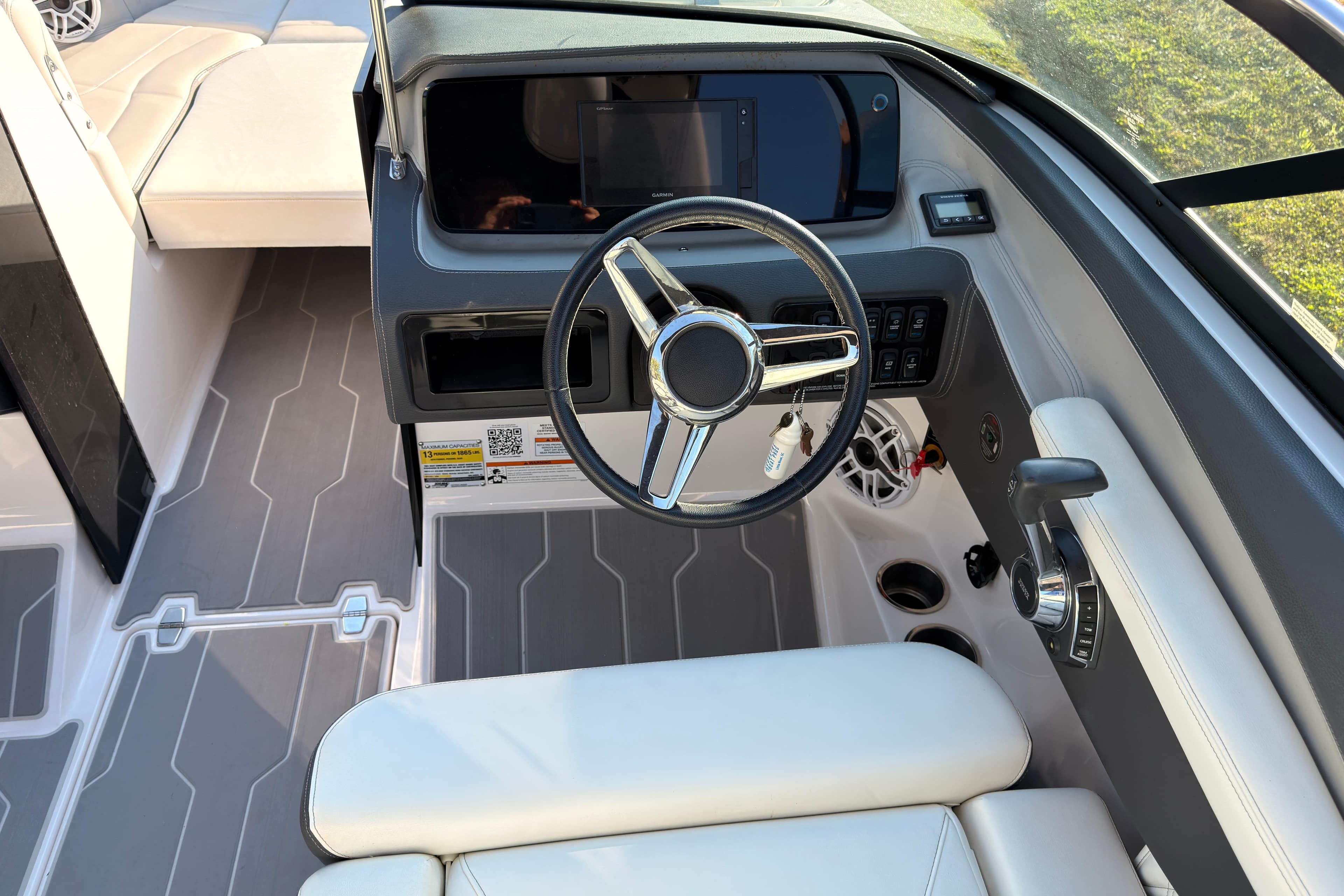 2019 Regal LS4 boat cockpit with steering wheel and modern dashboard controls.