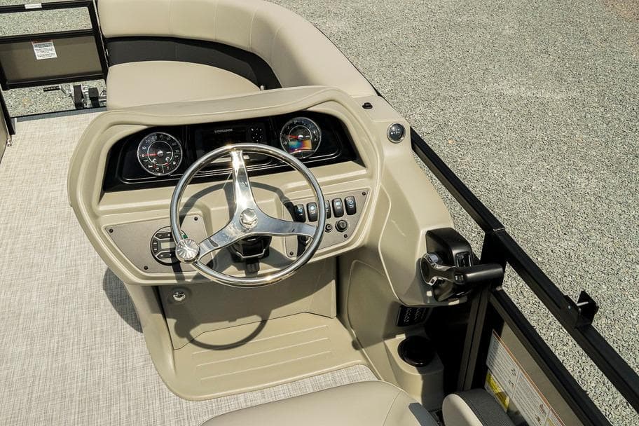 2026 Dockside 22DF boat dashboard with steering wheel and control panel.