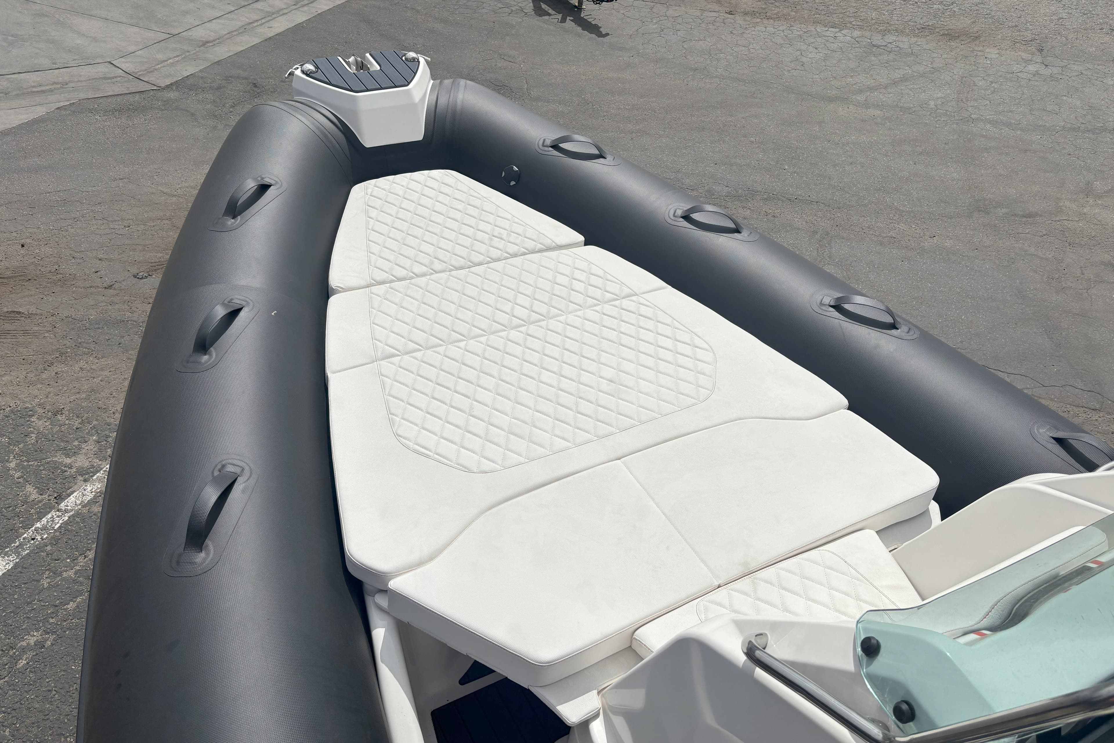 2026 Zodiac Medline 7.5 GT boat with cushioned seating and sleek design.