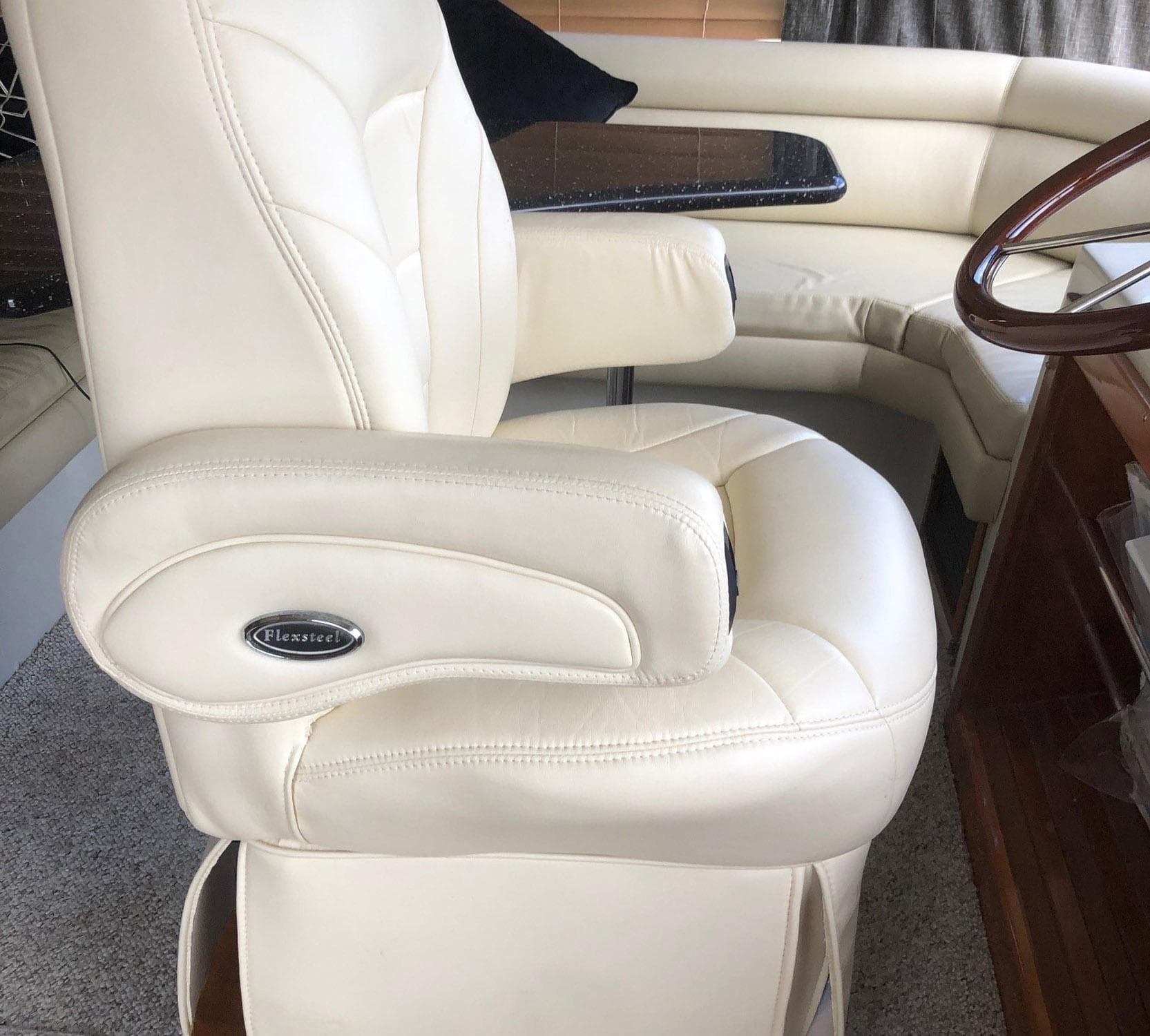 Luxurious captain's chair in a 2005 Navigator 53 Classic PH yacht.