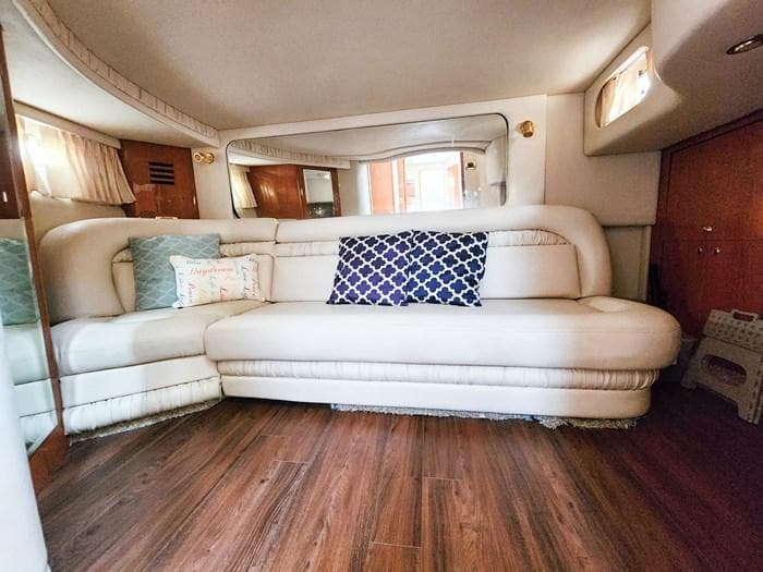 Luxurious interior of 1999 Sea Ray 460 Sundancer with plush seating and elegant decor.