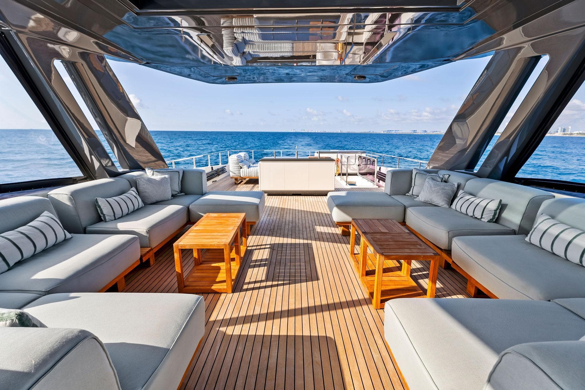 Luxurious 2020 Ferretti Yachts 920 interior with elegant seating and ocean view.