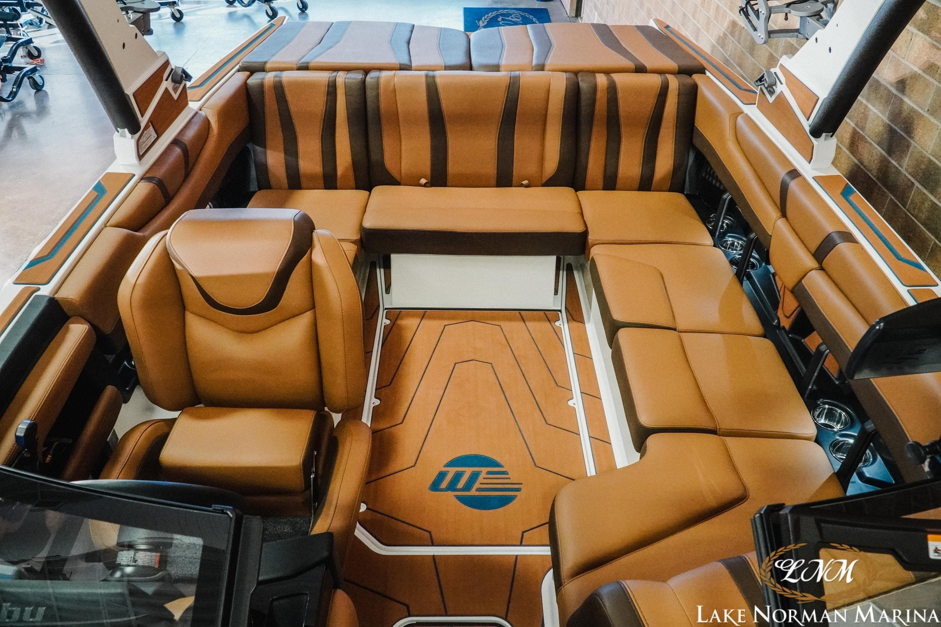 2026 Malibu Wakesetter 21 LX interior with luxurious brown seating and stylish design.