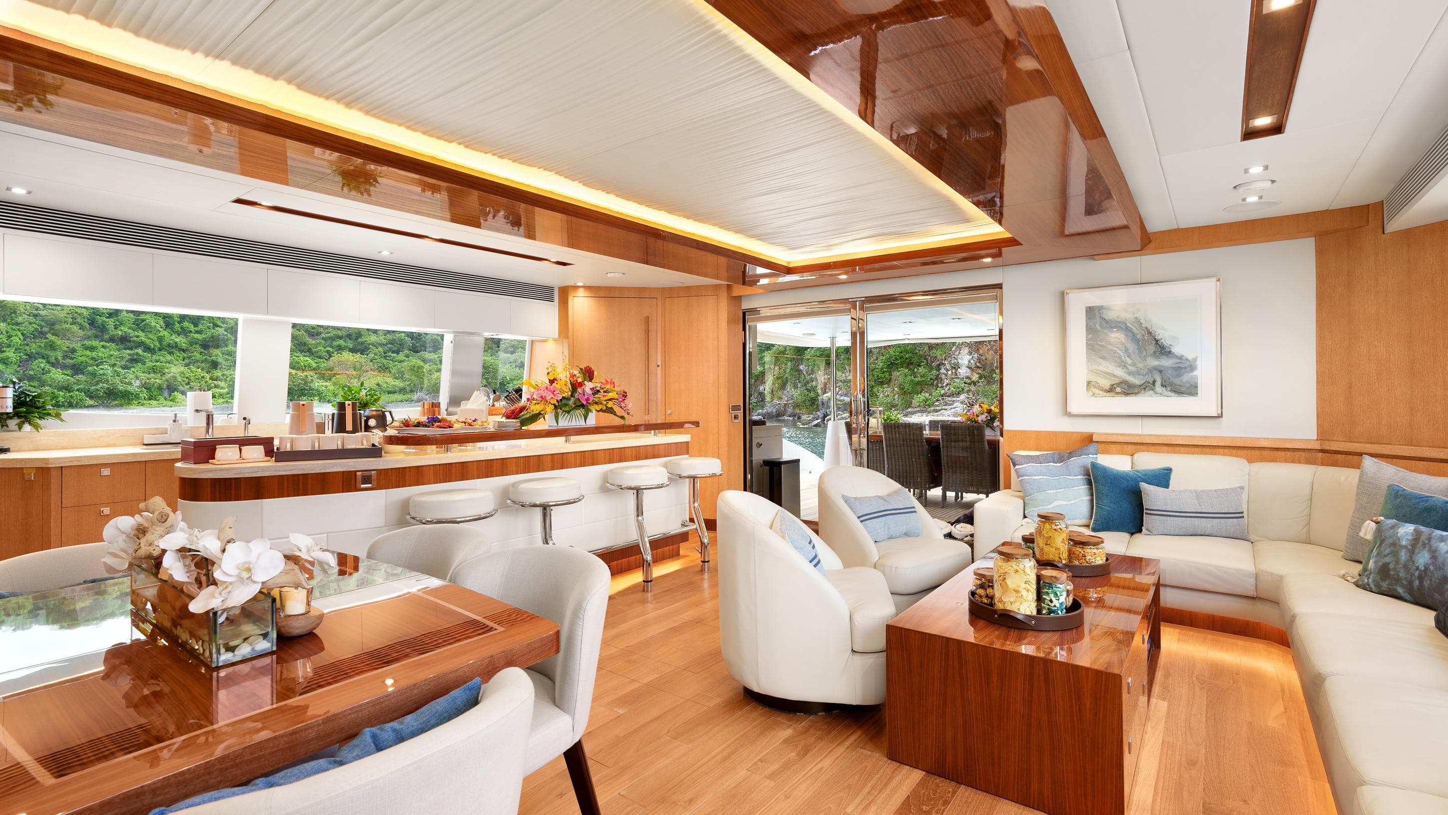 Luxurious Horizon PC74 yacht interior with elegant seating, dining area, and modern decor, 2018 model.