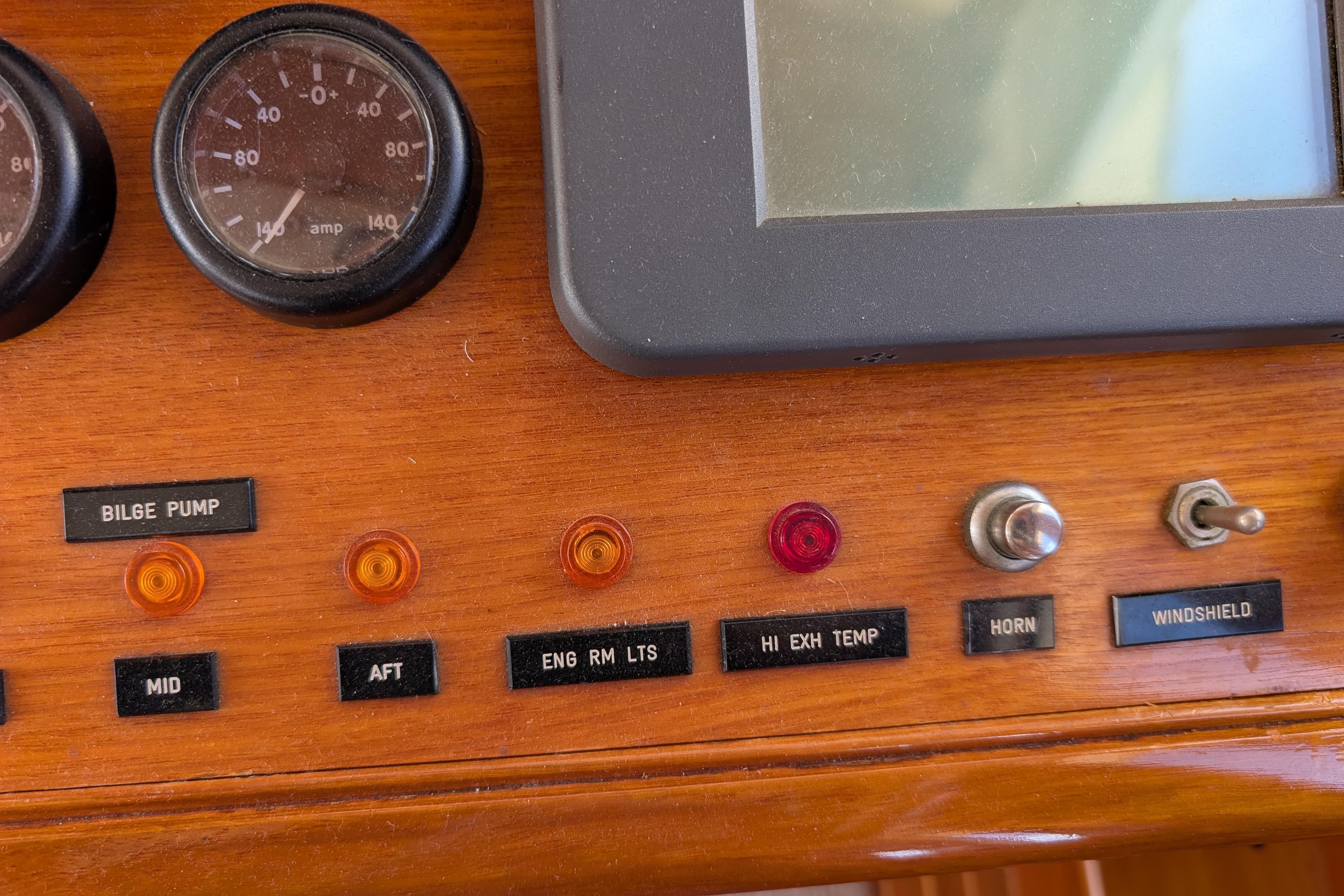 2006 Grand Banks 49 Eastbay SX dashboard with gauges, switches, and indicator lights.