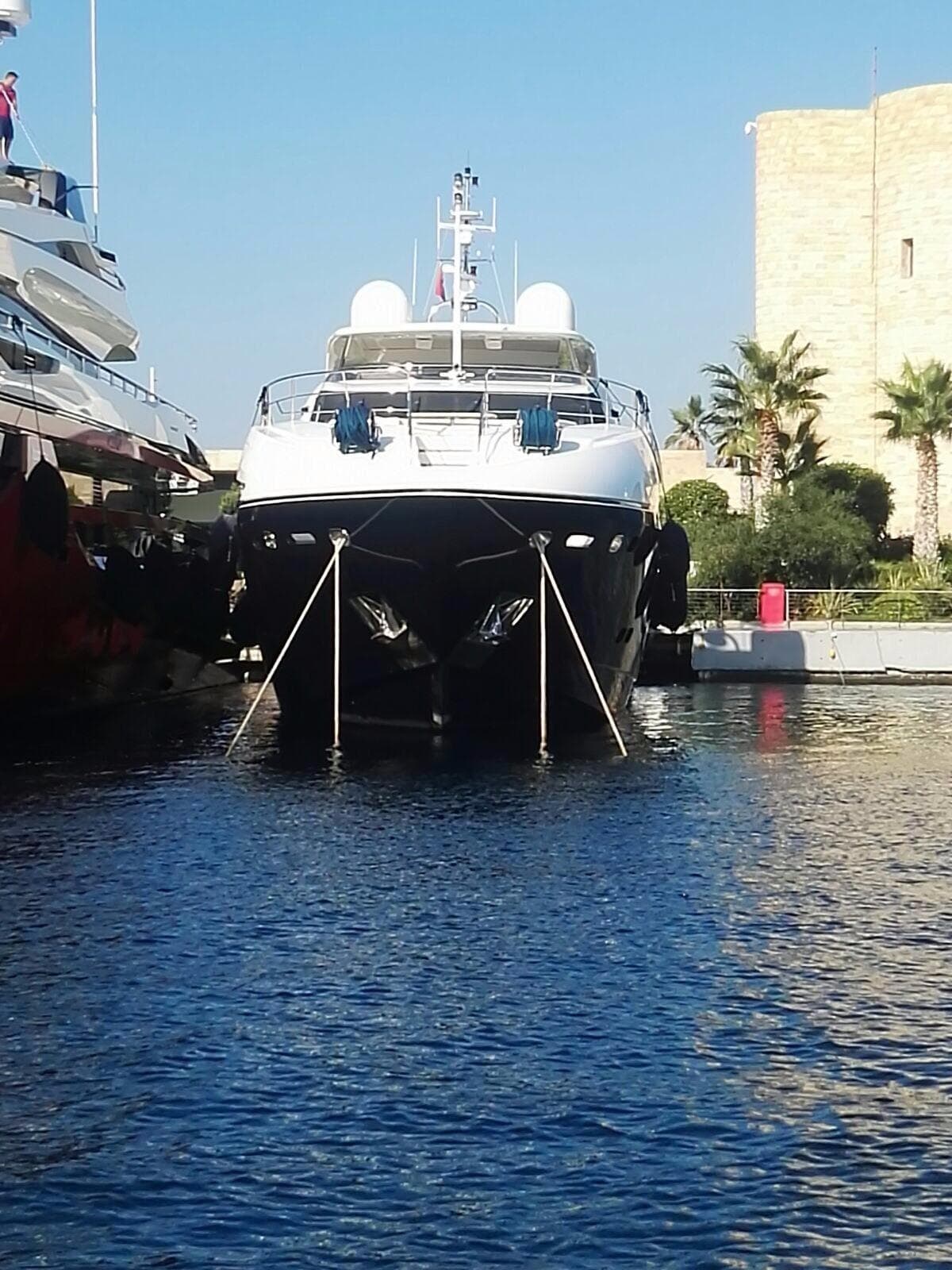 2011 Sunseeker 34 Metre Yacht docked in a marina, front view.