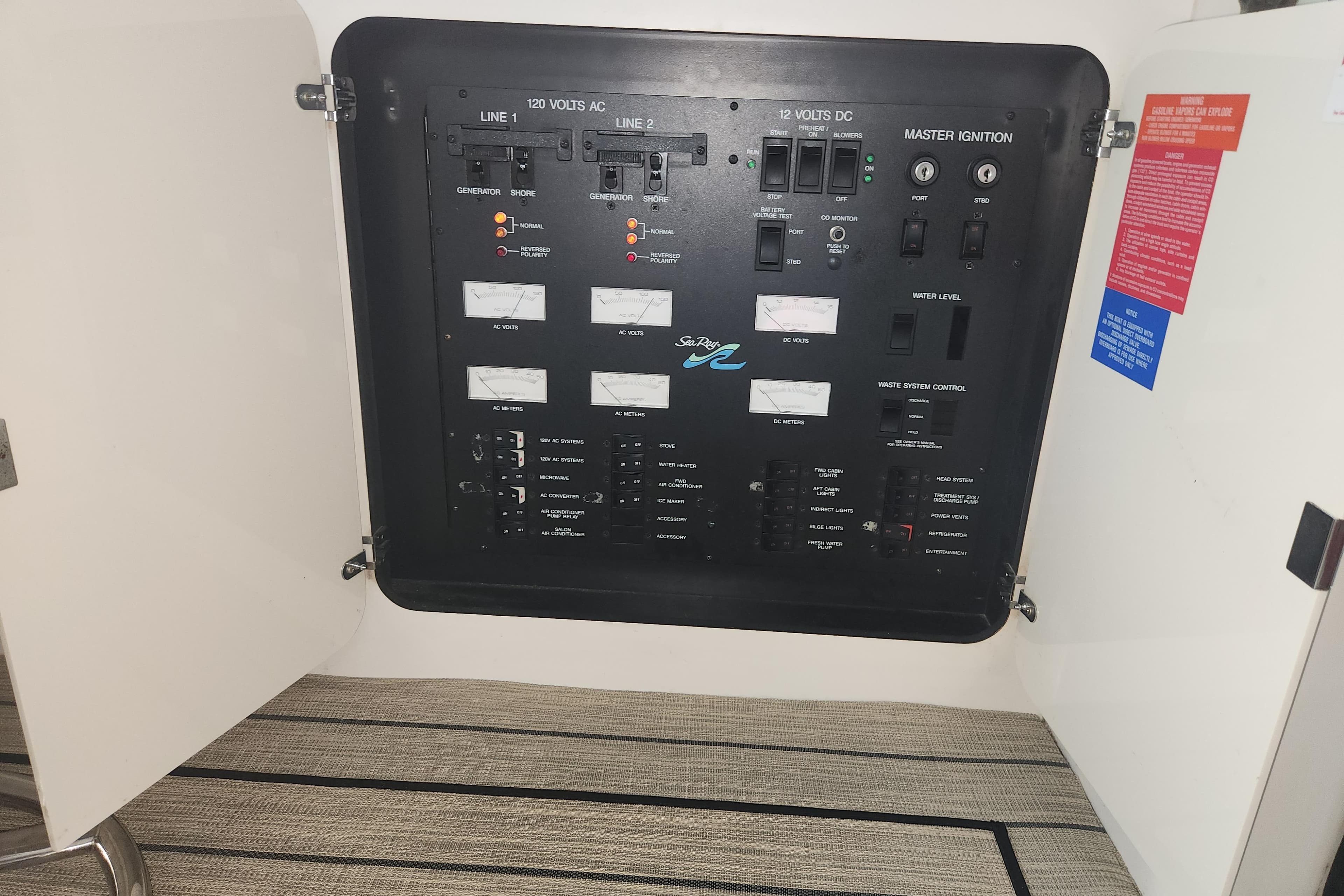 Electrical control panel of a 1996 Sea Ray 370 Sedan Bridge boat.