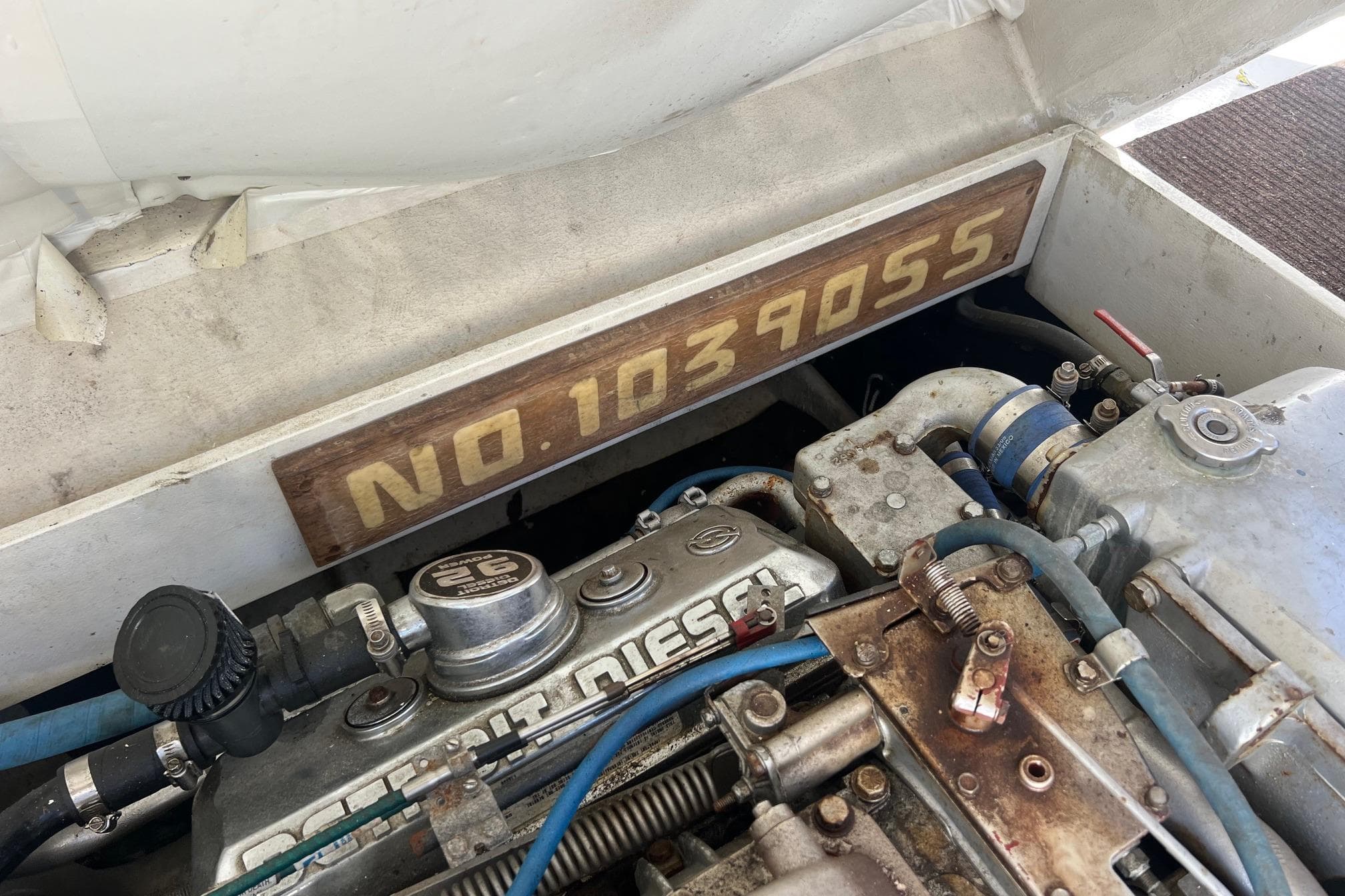 Engine compartment of 1995 Young Brothers 38 Fly Bridge with visible serial number.