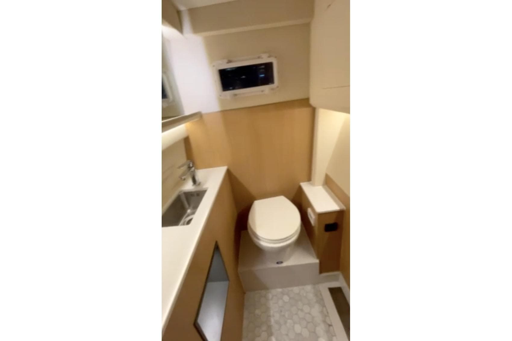 2025 Norseman C280 Center Console boat interior with compact bathroom amenities.